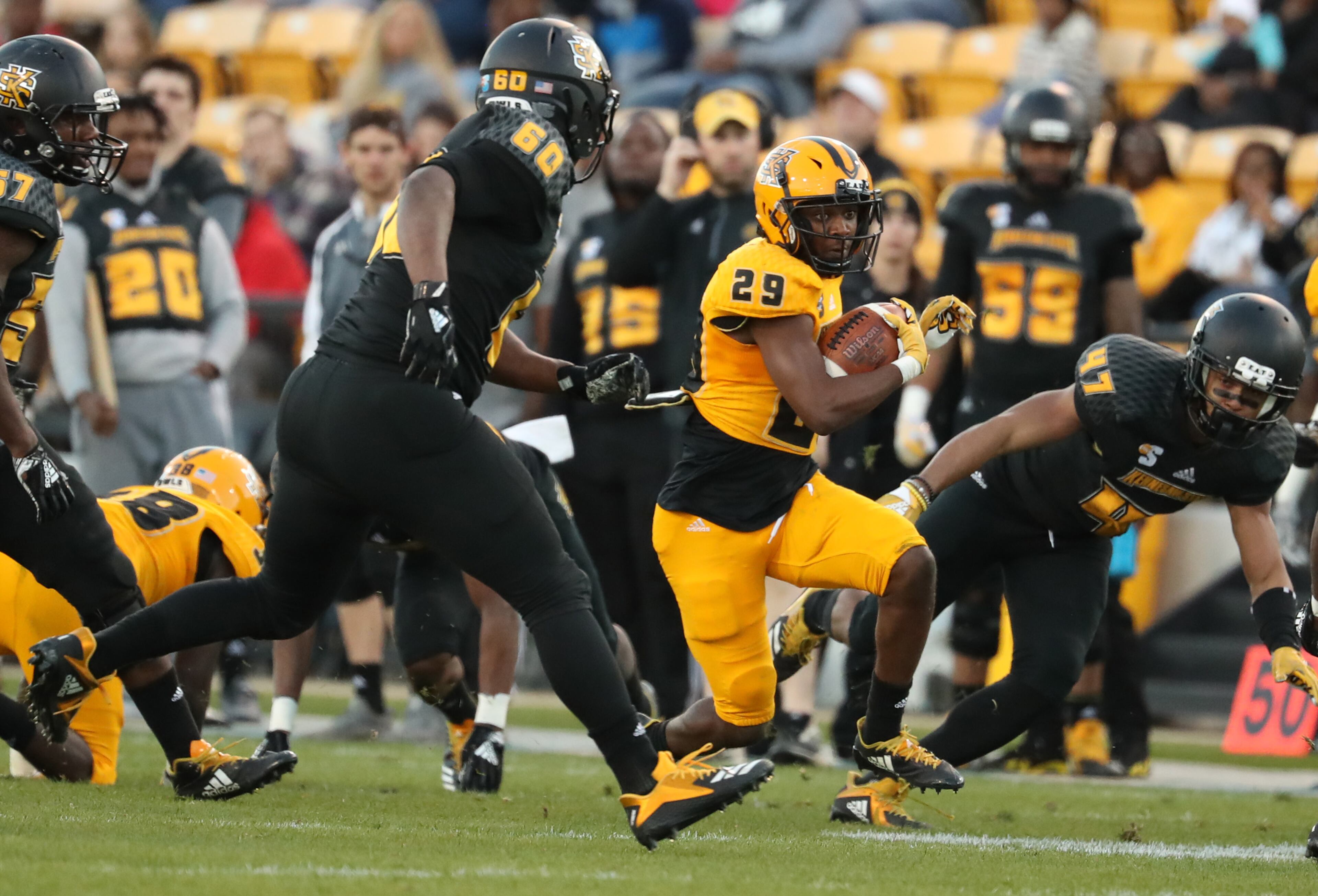 March 22, 2019 - Kennesaw, Ga: Kennesaw State Owls running back Antavius Grier (29) runs for yards during the KSU spring football game at Fifth Third Bank Stadium Friday, March 22, 2019 in Kennesaw, Ga.. (JASON GETZ/SPECIAL TO THE AJC)