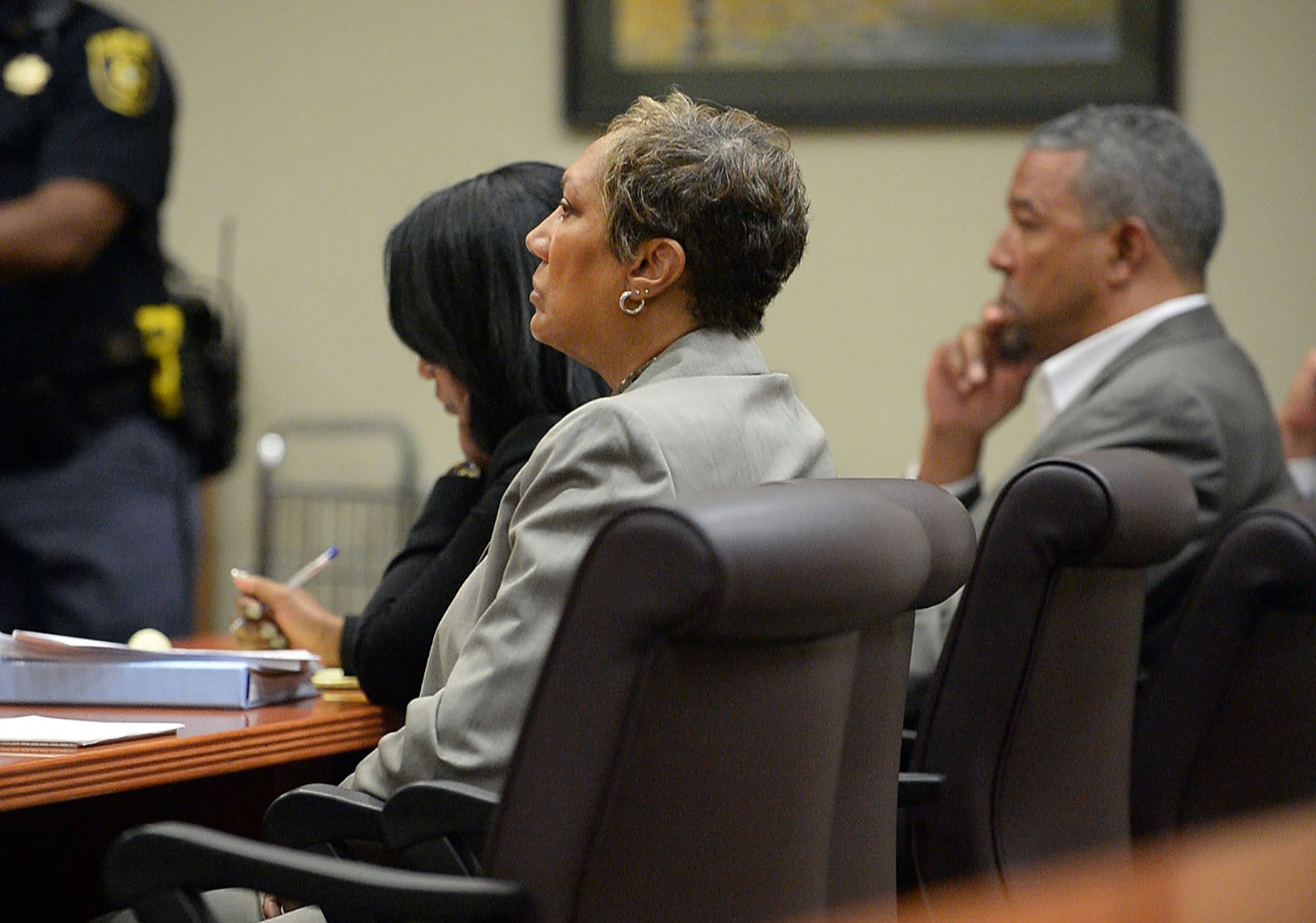 ... and a jury found former DeKalb schools Chief Operating Officer Pat Reid (front) and architect Tony Pope (at right) guilty in November 2013 for their involvement in a school construction scandal. Lewis’ case is being appealed to the Georgia Supreme Court, and Reid and Pope (shown in May 2015) are serving five-year sentences. -- Text by AJC staff reporters