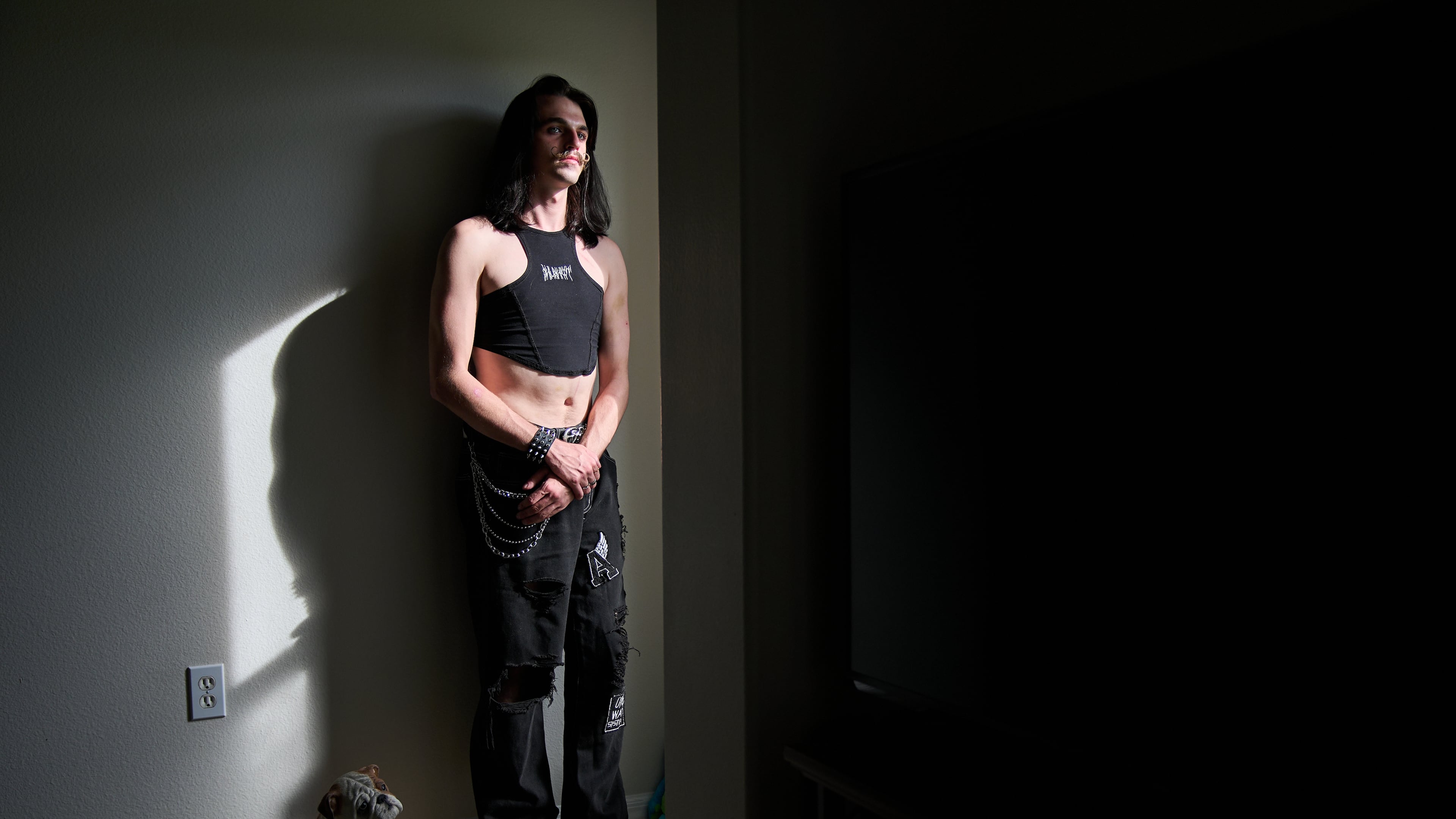 Elijah Button, 21, poses for a portrait in St. Cloud, Fla., Thursday, Aug. 13, 2026. (AP Photo/Jacquelyn Martin)