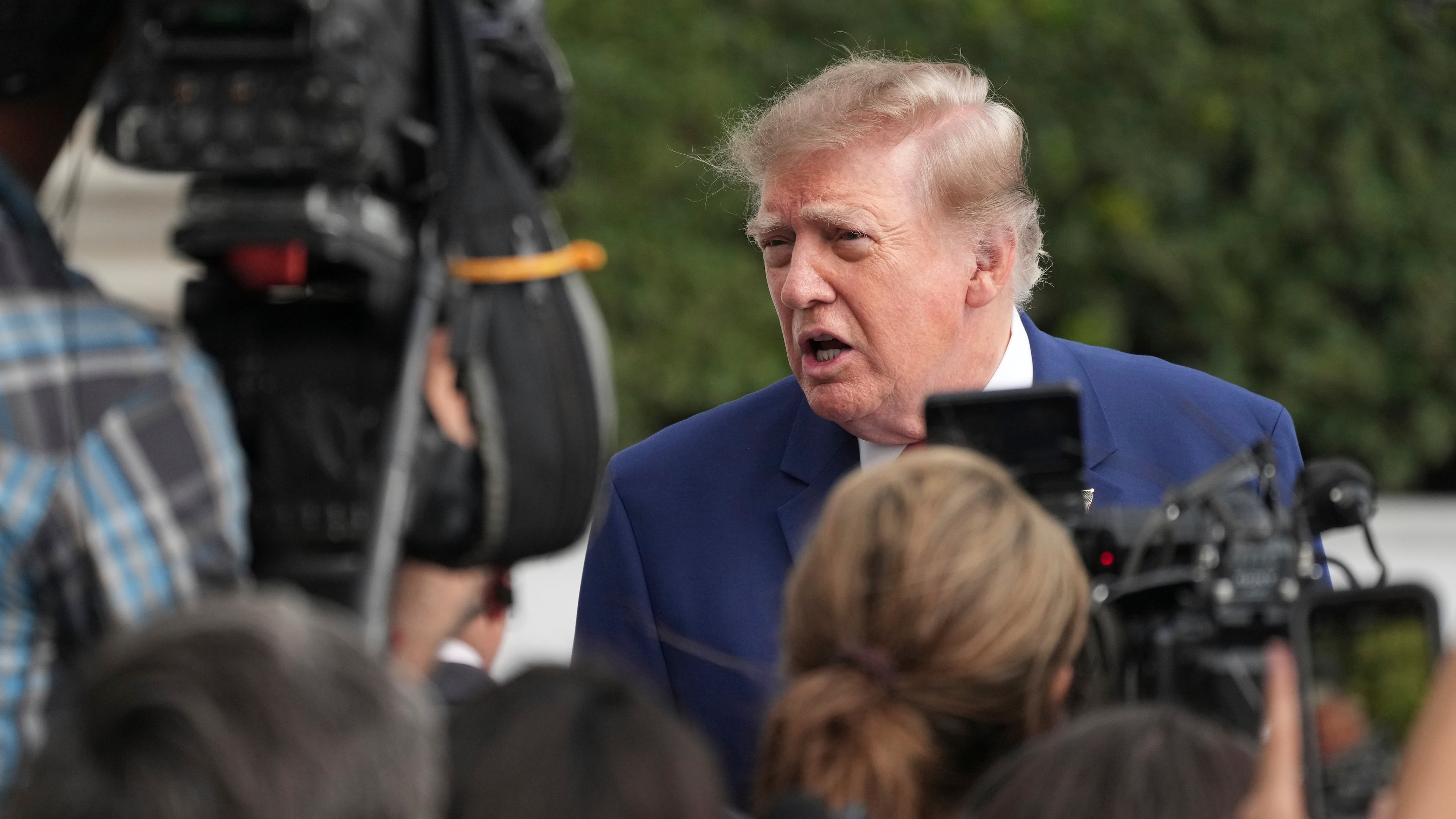 President Donald Trump speaks to reporters on the South Lawn of the White House, Friday, Oct. 16, 2026, in Washington. (AP Photo/Jacquelyn Martin)