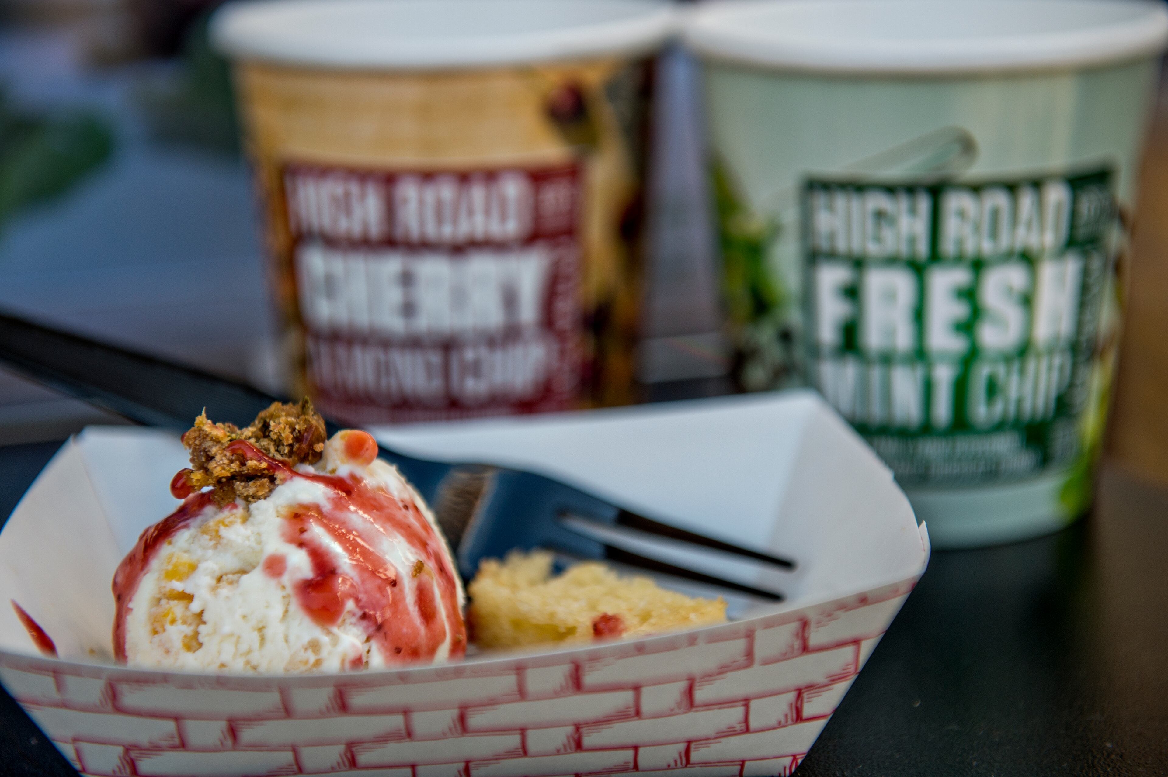 High Road Craft Ice Cream serves up sweet corn and goat cheese ice cream with a garlic and olive oil muffin, roasted poblano streusel and strawberry jam during the Atlanta Brunch Festival at Fourth Ward Park in Atlanta on Saturday, March 5, 2016. JONATHAN PHILLIPS / SPECIAL