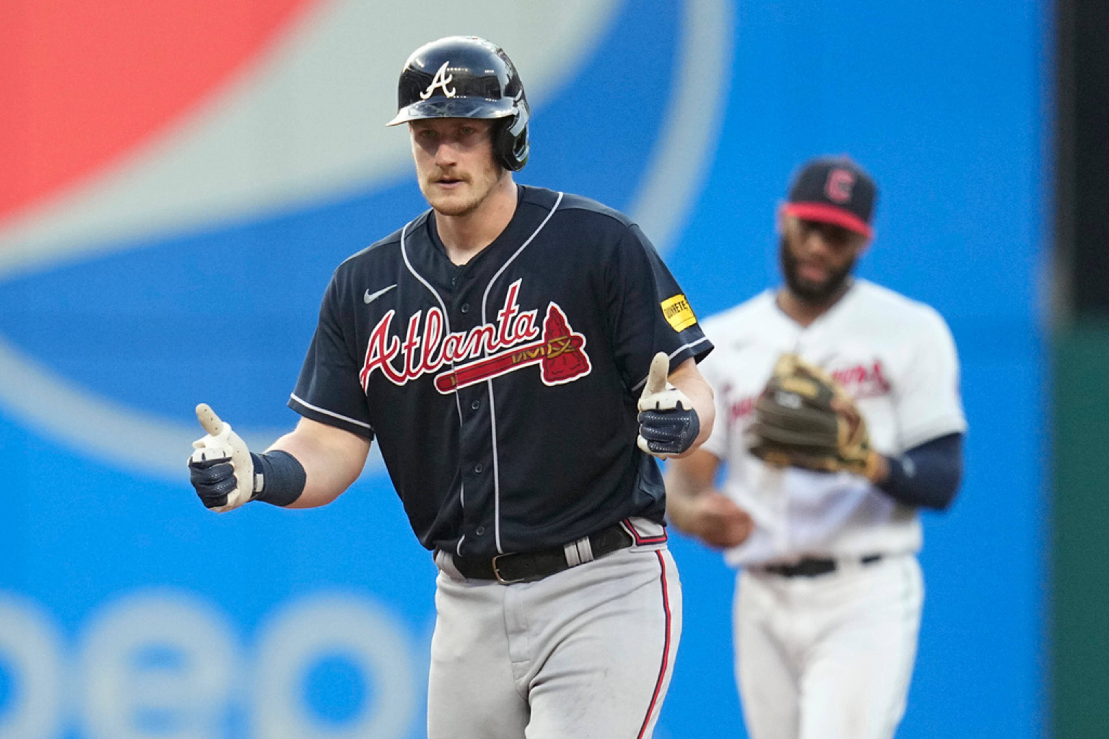 Atlanta Braves' Sean Murphy gestures from second base after hitting a double in the sixth inning of a baseball game against the Cleveland Guardians, Monday, July 3, 2023, in Cleveland. (AP Photo/Sue Ogrocki)