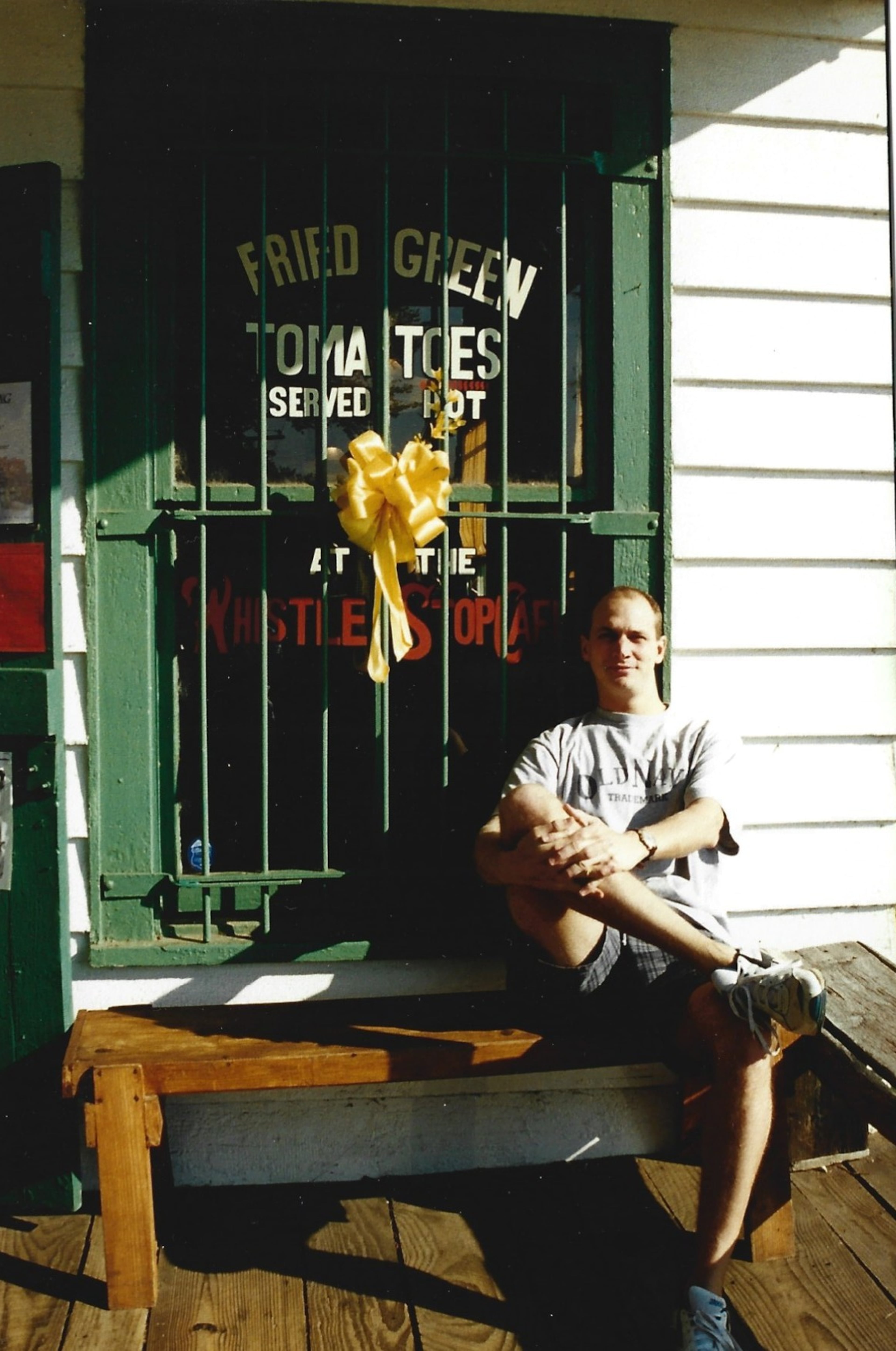 Steve Leo sits in front of the well-known Whistlestop Cafe in Juliette, Georgia, which is featured in the film "Fried Green Tomatoes." (Courtesy of Steve Leo)