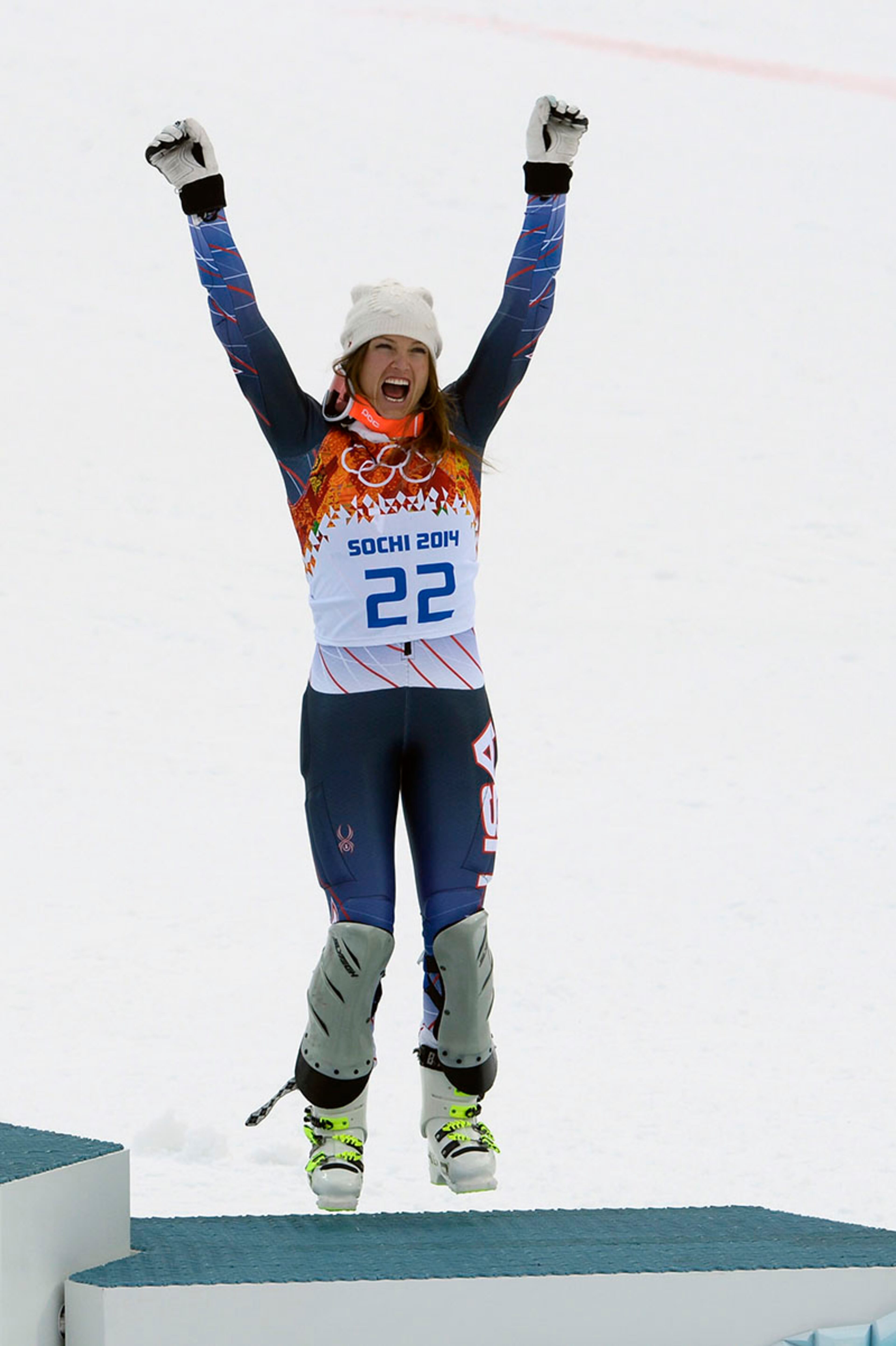 Julia Mancuso, 29, jumps for joy after collecting her fourth Olympic medal - a bronze in the women's super-combined,