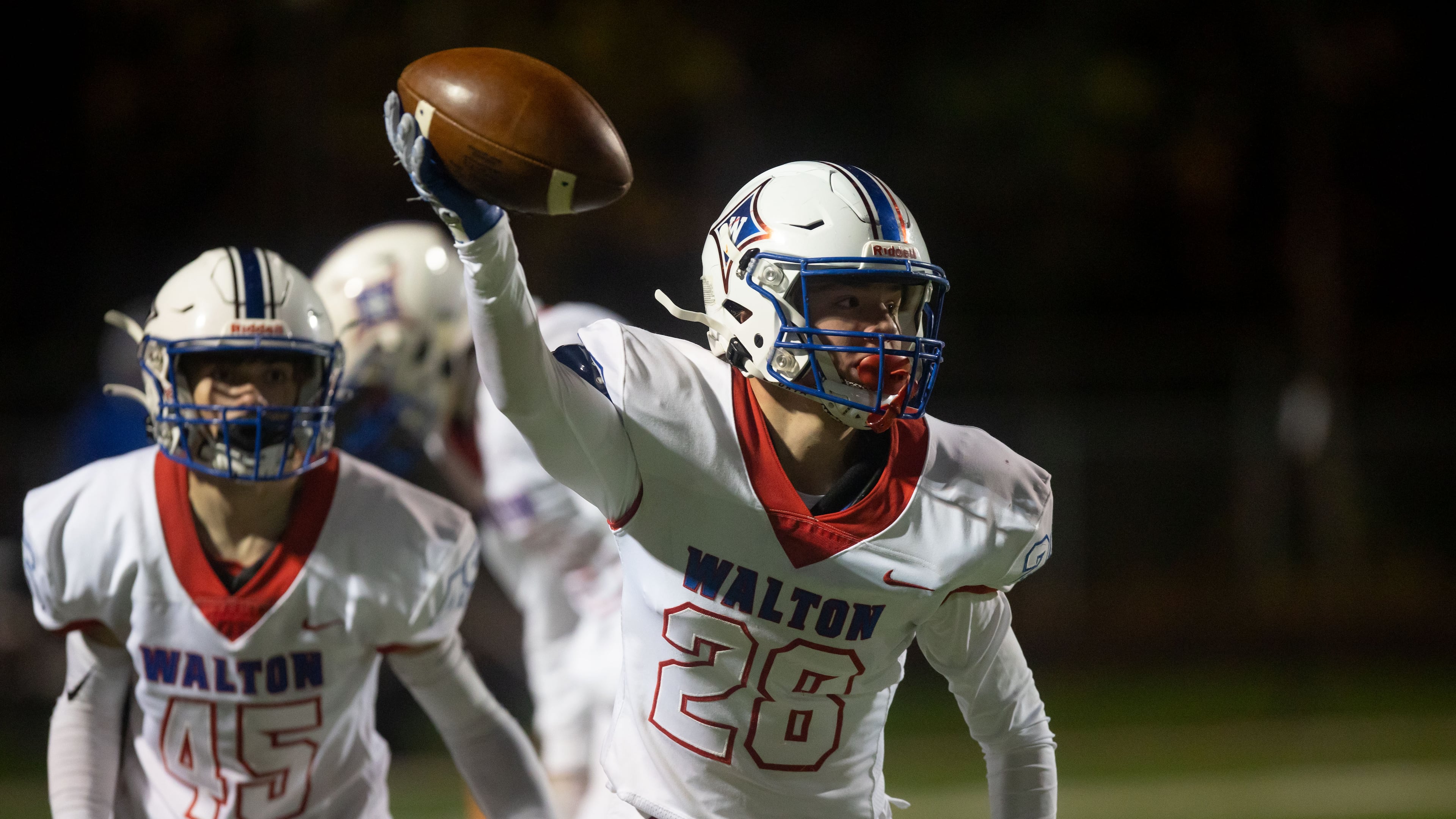 Walton's Davis Callahan (28) celebrates an interception during a GHSA high school football playoff game between the Archer Tigers and the Walton Raiders at Archer High School in Lawrenceville, GA., on Friday, November 19, 2021. (Photo/Jenn Finch)