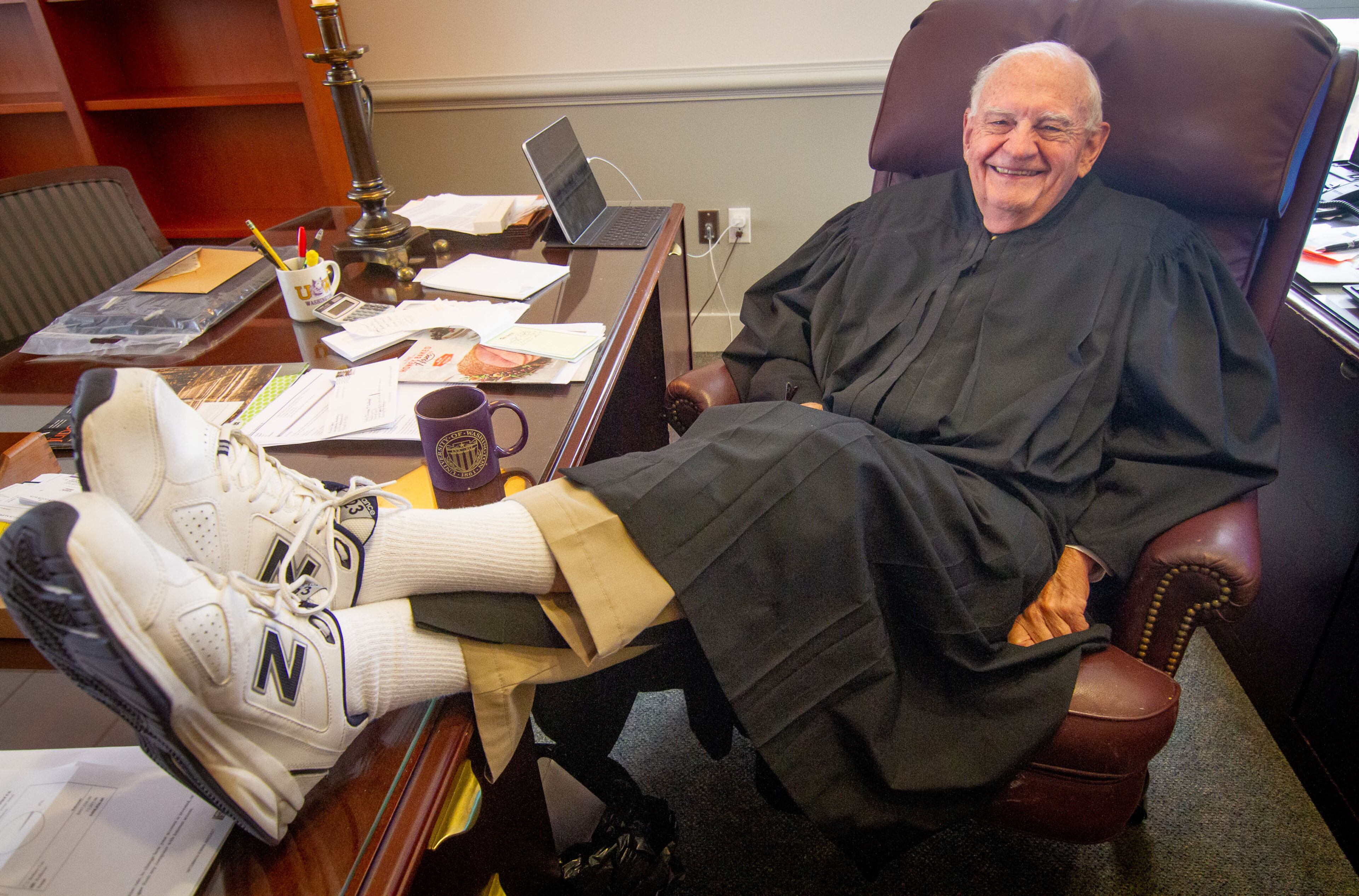 DeKalb County Superior Court Judge Clarence Seeliger shows off his tennis shoes in his DeKalb County Courthouse office in Decatur November 4, 2020. Seeliger will be retiring at the end of the year after 40 years on the bench. STEVE SCHAEFER FOR THE ATLANTA JOURNAL-CONSTITUTION