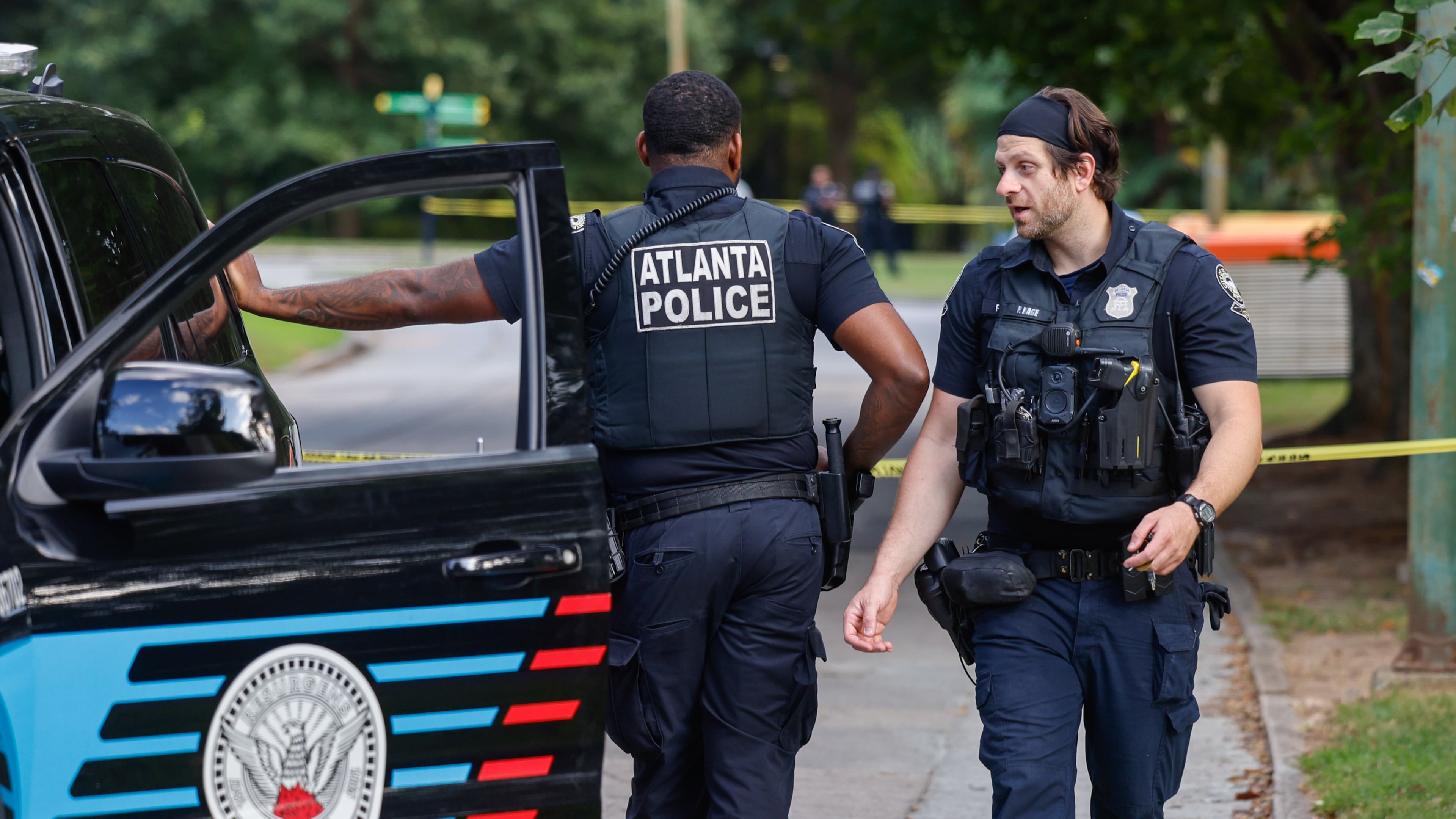 Atlanta police work the scene near Piedmont Park’s Active Oval on Wednesday, Sept. 9, 2026, as they investigate reports of shots fired within the park. (Arvin Temkar/AJC)