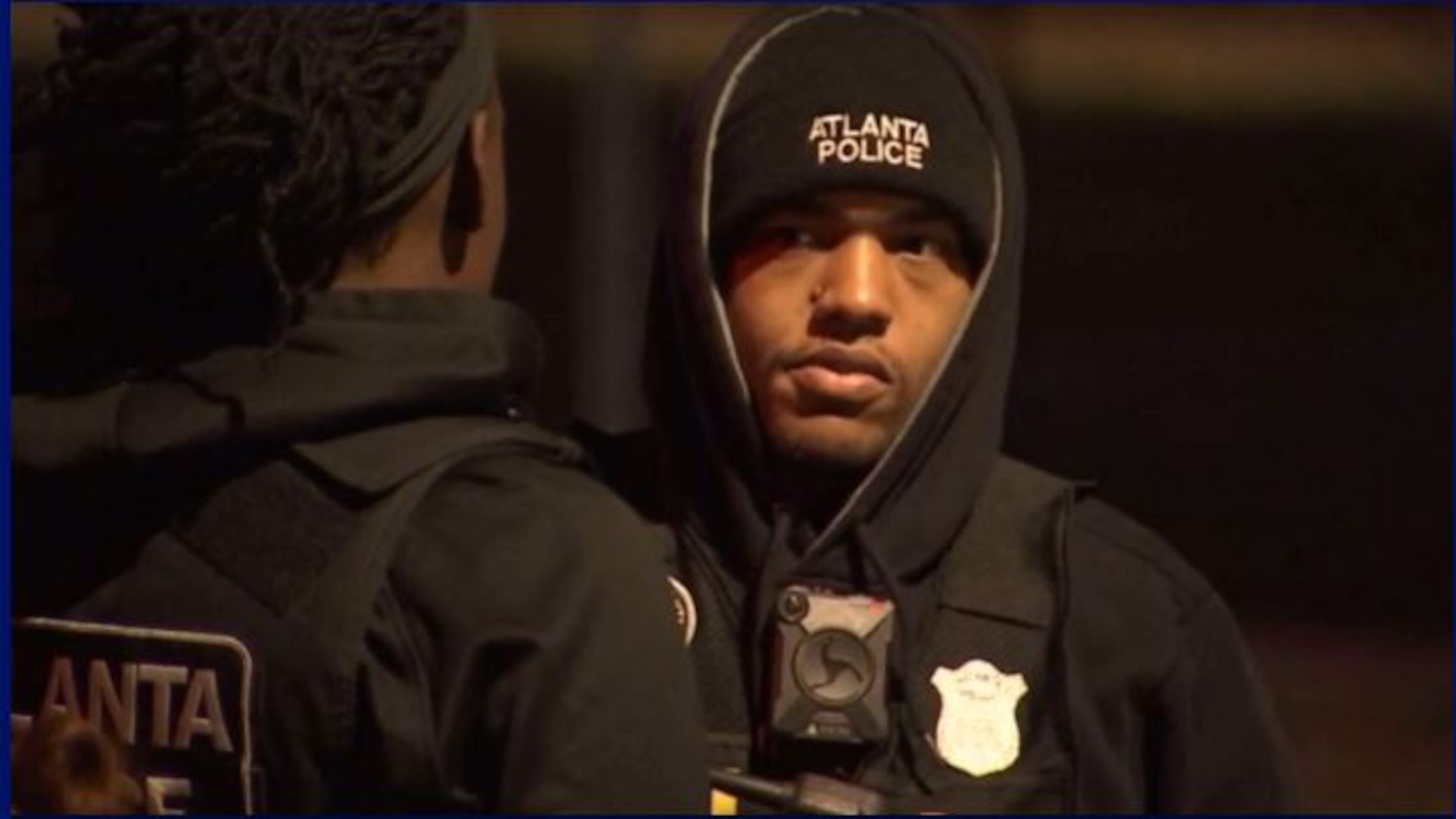 Atlanta police searched an open field Saturday night after a man was shot and killed. (Credit: Channel 2 Action News)