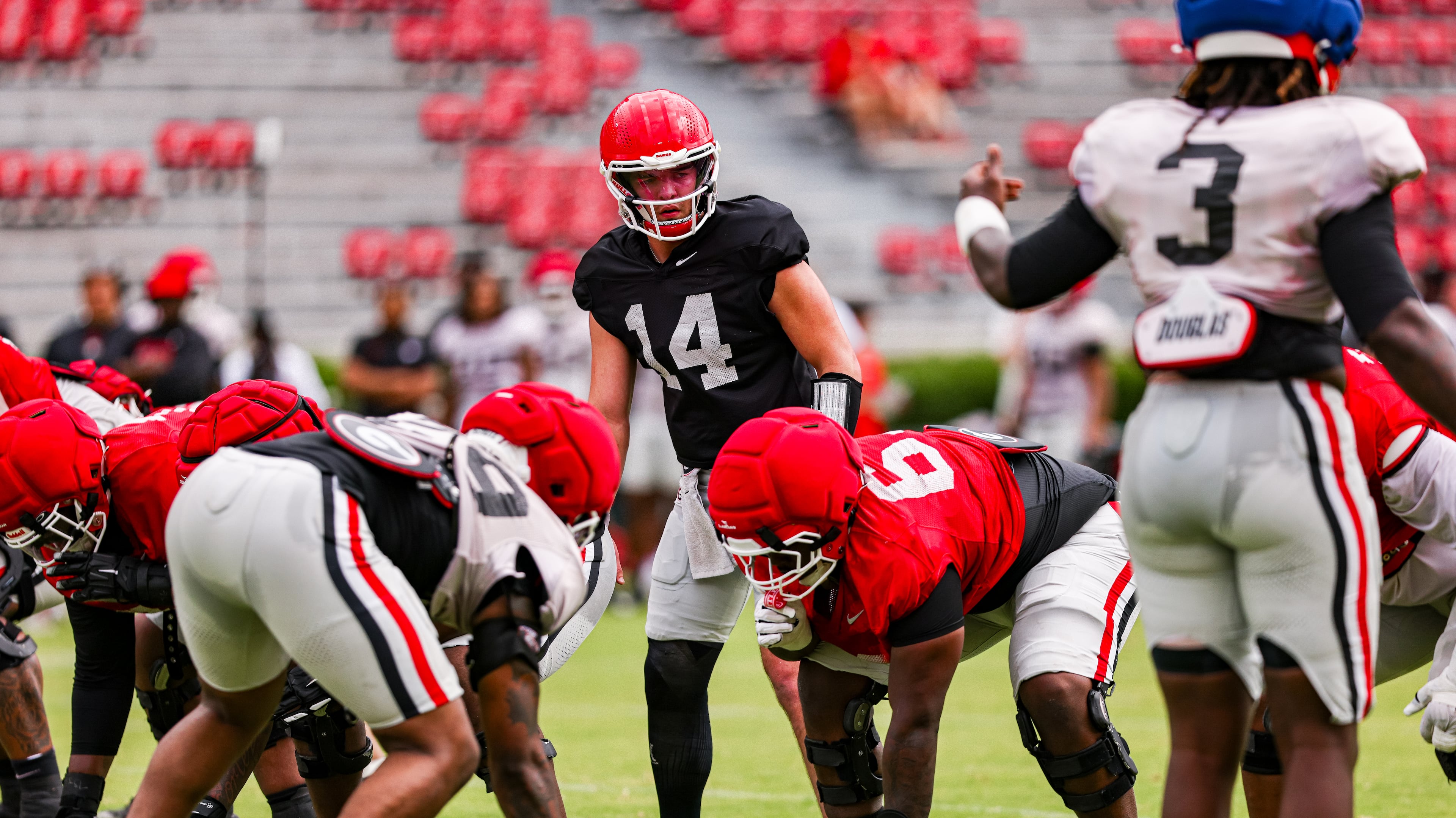 Georgia quarterback Gunner Stockton (14) and his teammates practice on Dooley Field at Sanford Stadium in Athens on Saturday, April 4, 2026. (Tony Walsh/UGAAA)