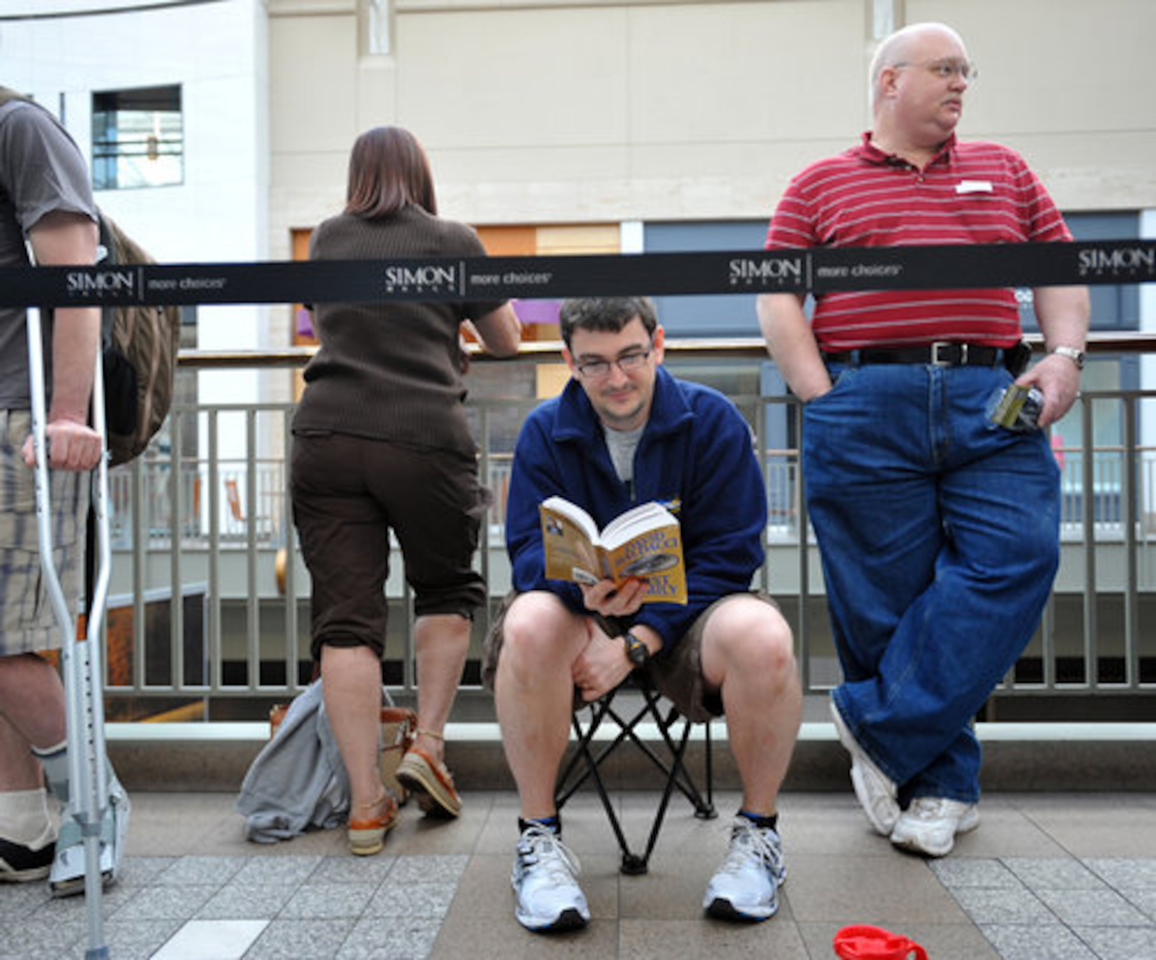 Chris Foster was motivated to get to the Apple Store by 5:45 a.m. to get get a spot near the front of the line. "We're going on vacation right after this, so my wife wasn't going to be happy if this took until noon."