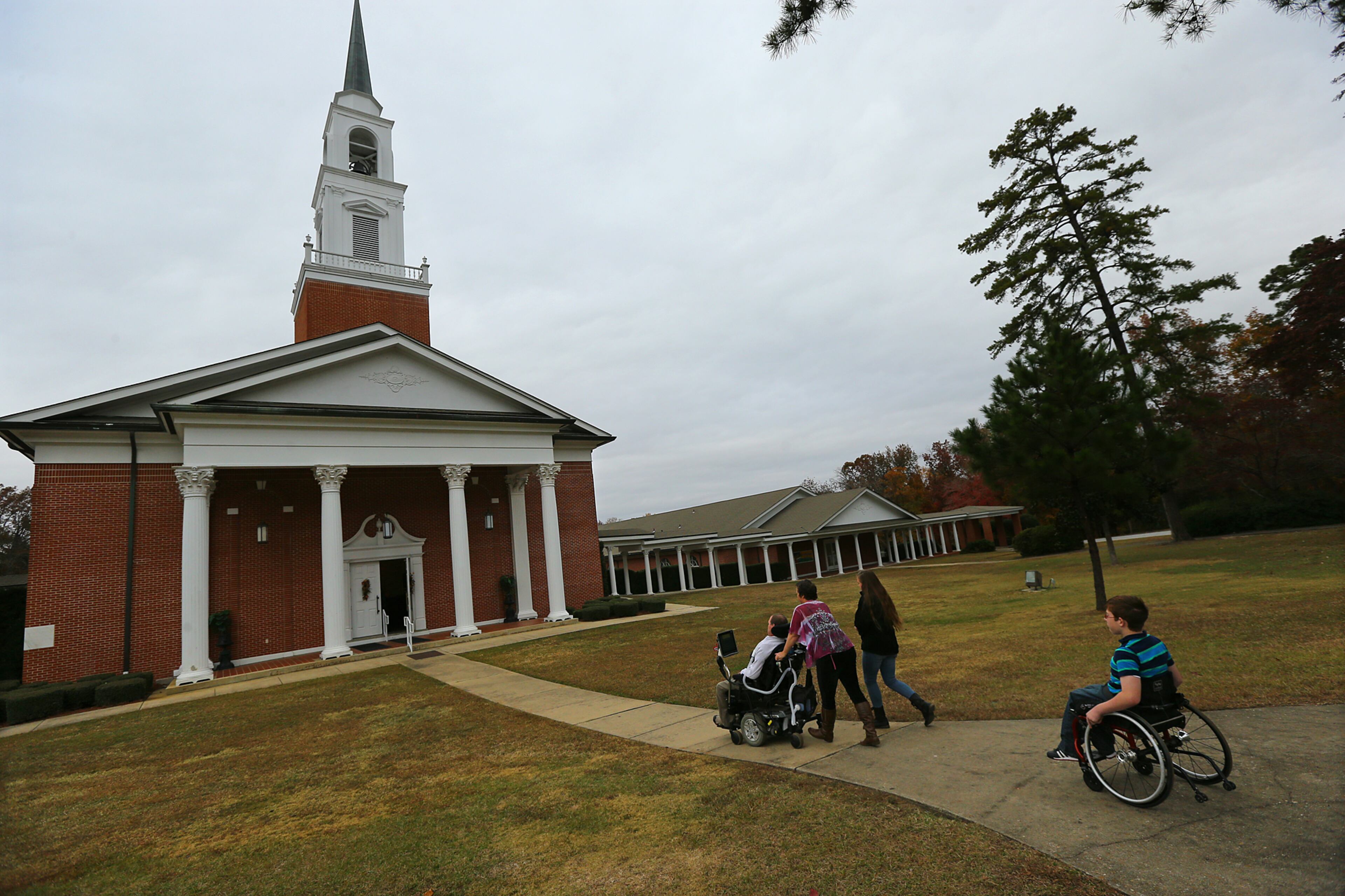 The Williams family, Jeremy (from left), Jennifer, Josie, 13, and Jacob, 11, arrive at Lakewood Baptist Church where Jeremy will deliver the Sunday morning sermons for both the 9:30 am Comtemporary Service and the 10:45 am Blended Service as guest speaker on Sunday, Nov. 16, 2014, in Phenix City. CURTIS COMPTON / CCOMPTON@AJC.COM