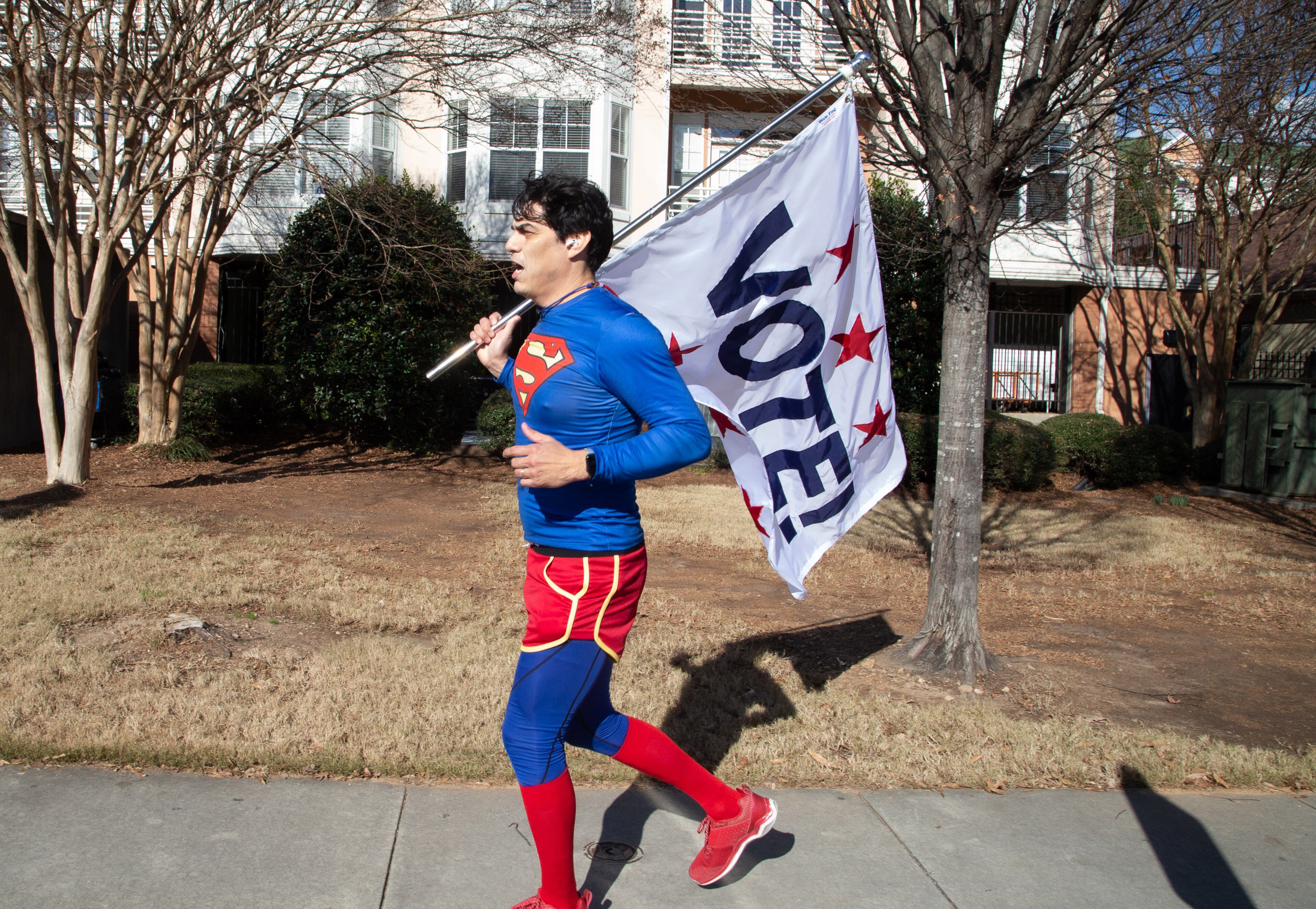 David Alcantar runs by the Decatur Recreation Center on his 4 mile run on January 5, 2021. STEVE SCHAEFER FOR THE ATLANTA JOURNAL-CONSTITUTION