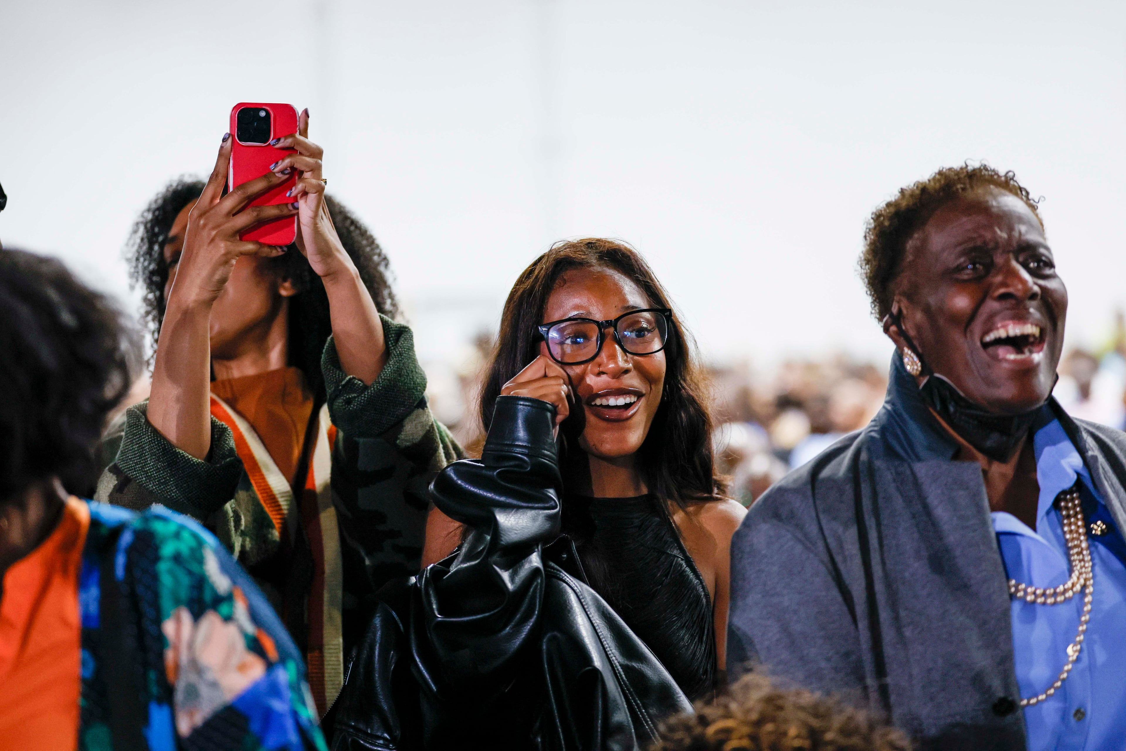 Friends and family cheer for their graduates during the Spelman College Commencement ceremony at the Georgia International Convention Center in College Park on Sunday, May 17, 2026. (Miguel Martinez/AJC)
