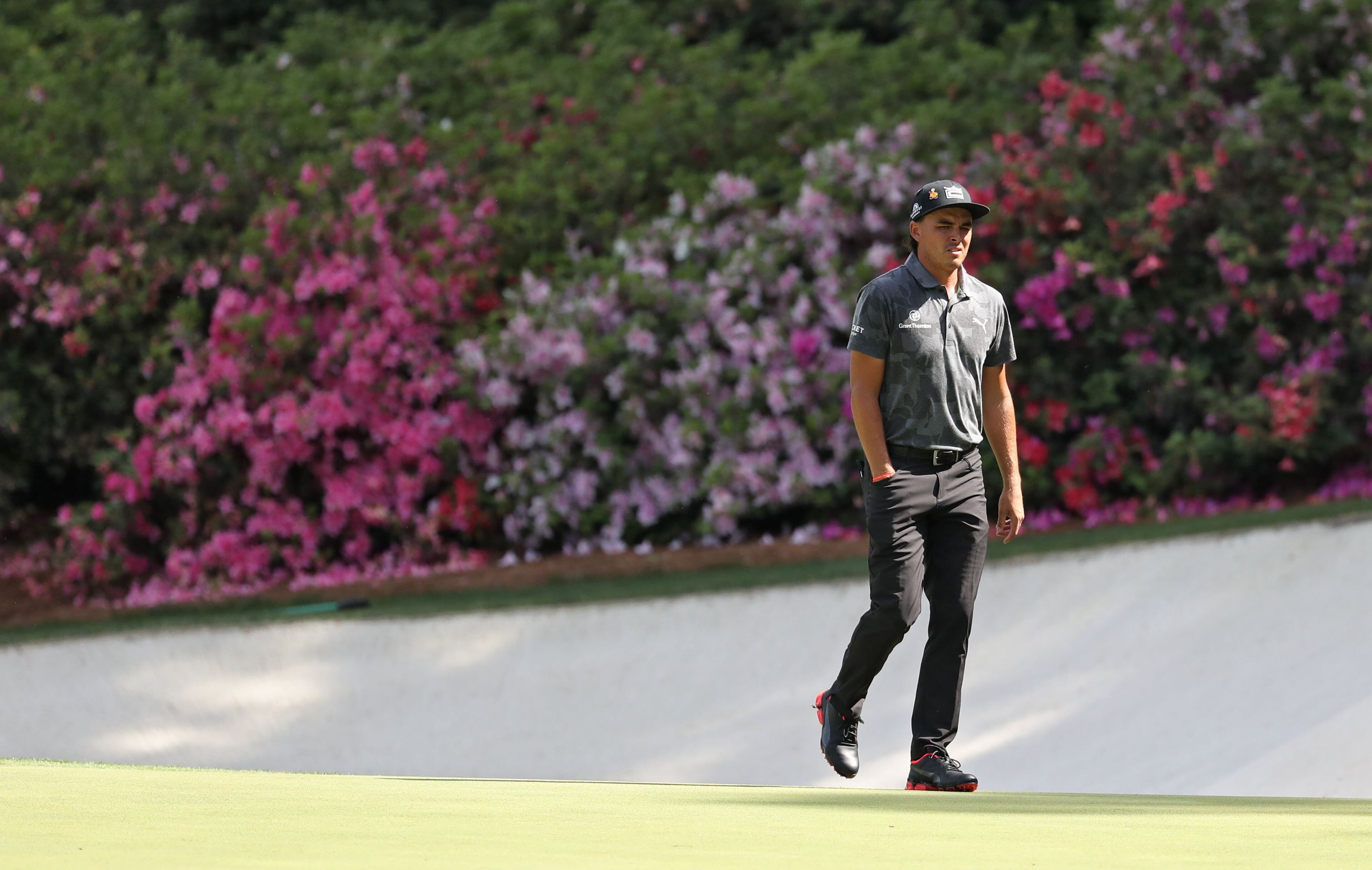 April 13, 2019 - Augusta - Rickie Fowler walks to the green on 13 during the third round of the Masters Tournament Saturday, April 13, 2019, at Augusta National Golf Club in Augusta. Jason Getz / Special to the AJC