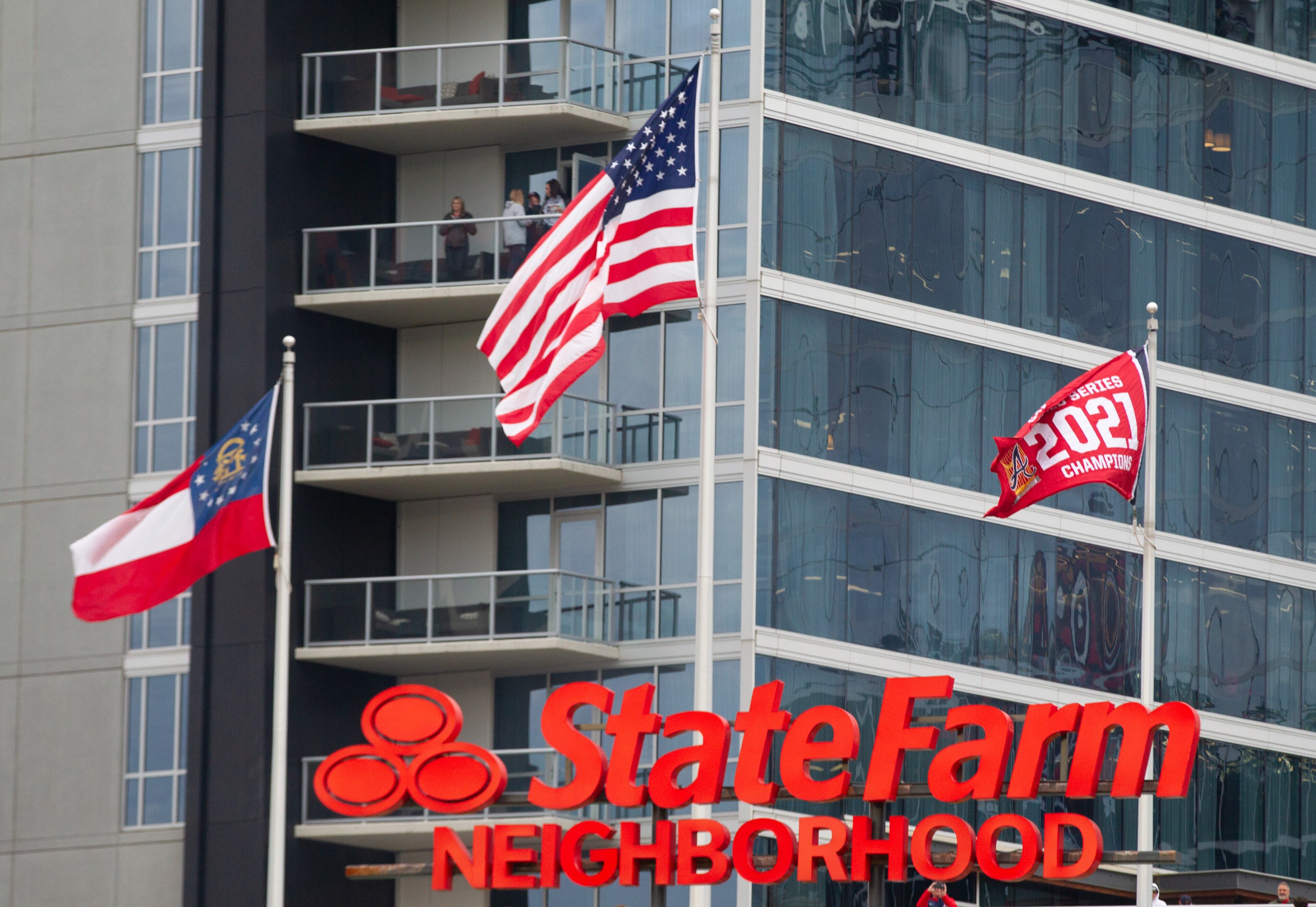 The 2021 World Champion Flag is raised before the game with the Cincinnati Reds at Truist Park Friday, April 8, 2022. (Steve Schaefer / steve.schaefer@ajc.com)