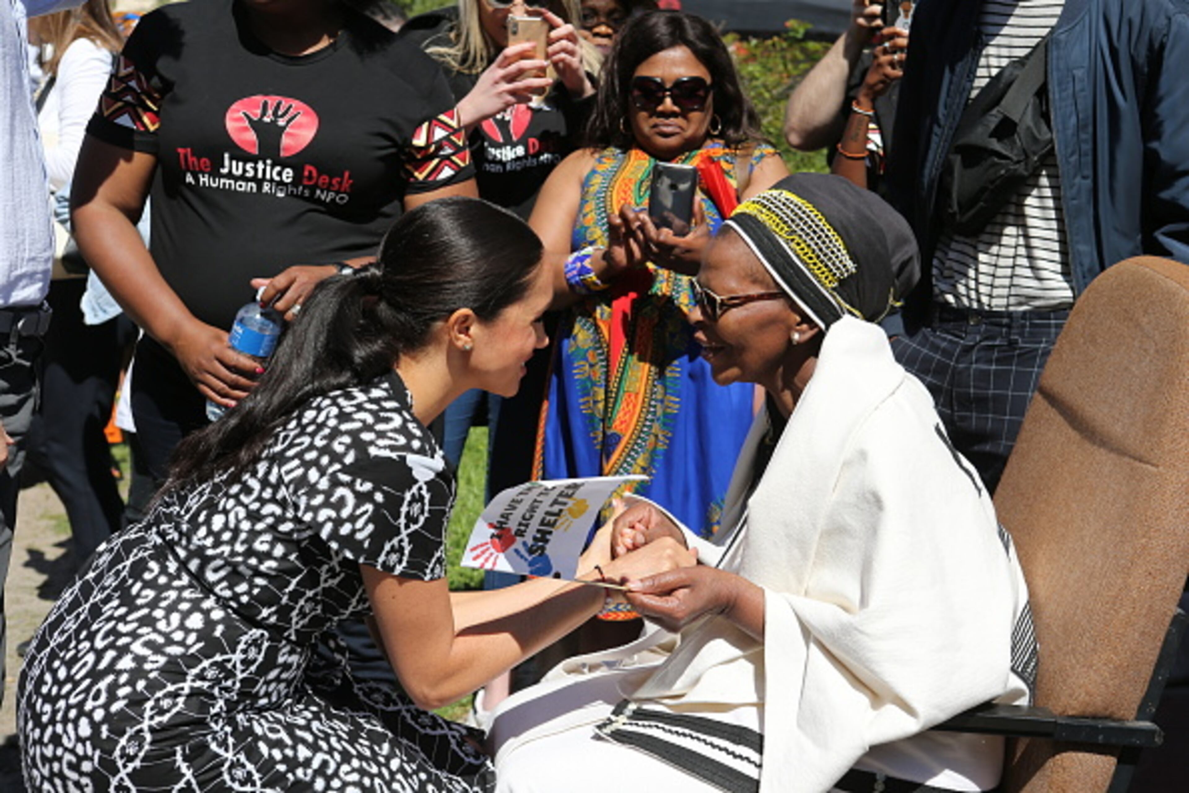 CAPE TOWN, SOUTH AFRICA - SEPTEMBER 23: Meghan, Duchess of Sussex greets a wellwisher during a visit to The Justice Desk on September 30, 2019 in Cape Town, South Africa. The Justice Desk initiative teaches children about their rights and provides self-defence classes and female empowerment training to young girls in the community. (Photo by Ian Vogler - Pool/Getty Images)
