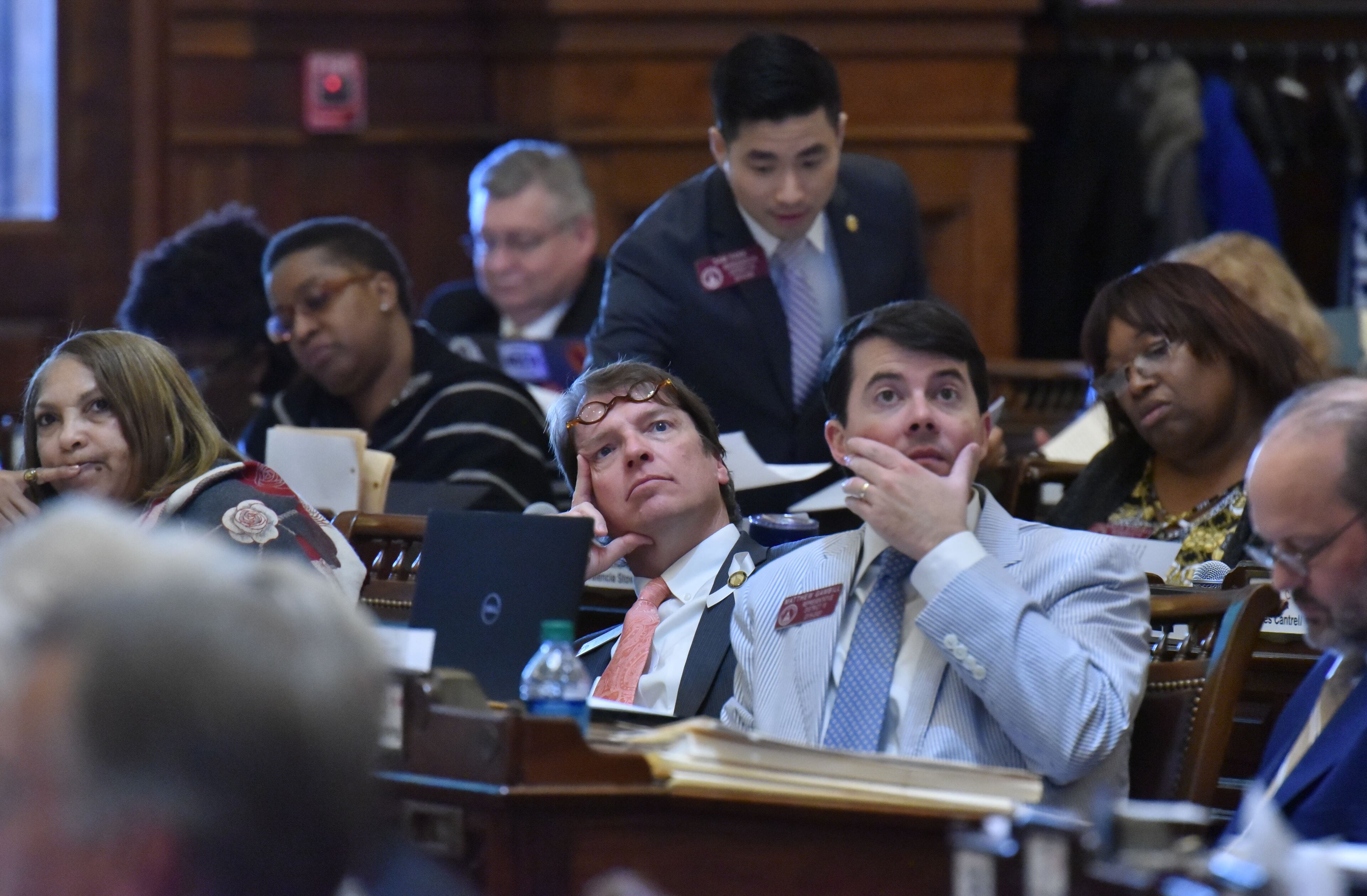 April 2, 2019 Atlanta - Rep. Spencer Frye (center) and other members of the House vote on SB 200, relating to exercise of power to contract by the Georgia Department of Transportation, in the House Chambers during the last day of legislation at the Georgia State Capitol on Tuesday, April 2, 2019. HYOSUB SHIN / HSHIN@AJC.COM