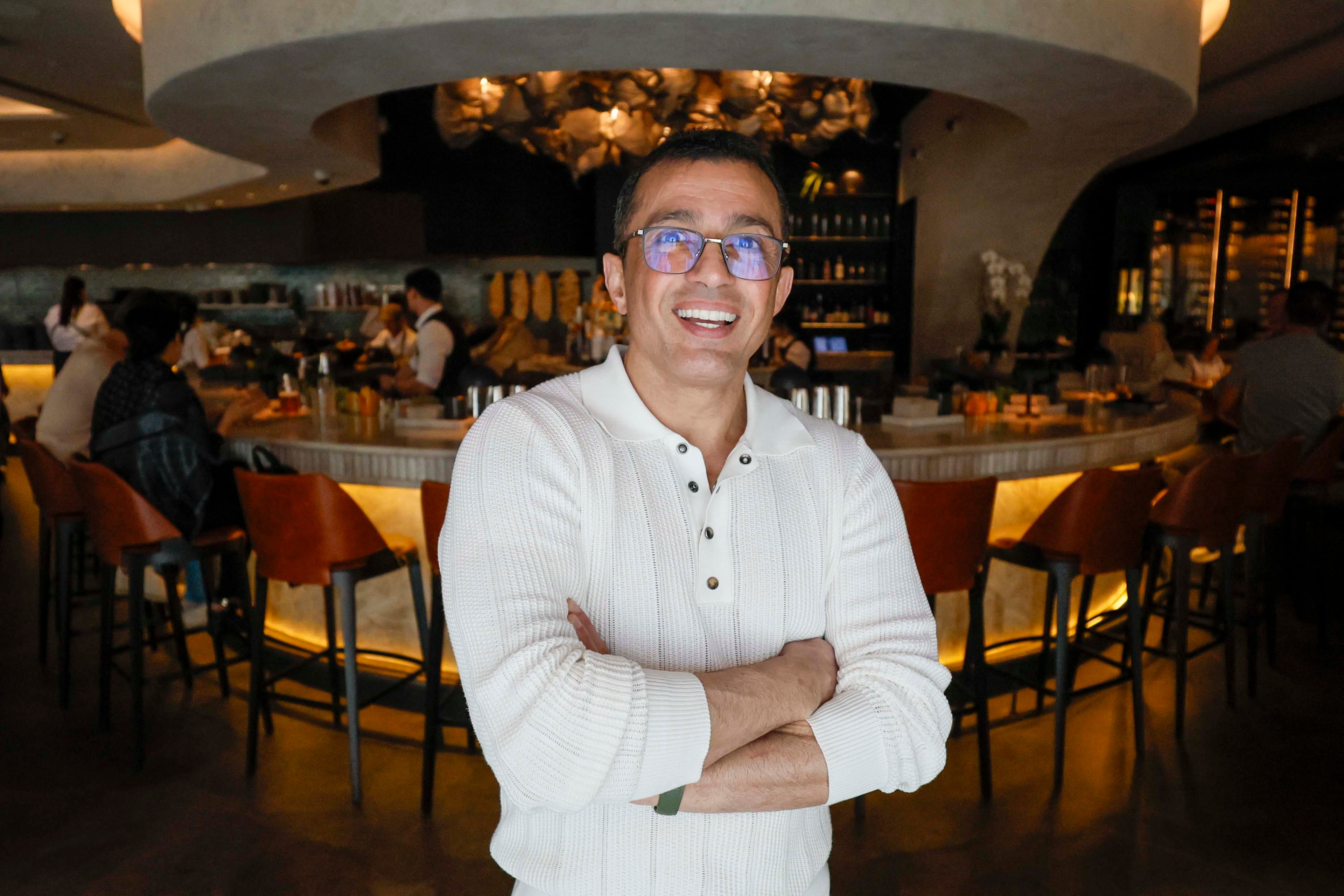 Chef Ali Mesghali poses for a photograph at Rumi’s Kitchen in Sandy Springs, reflecting on Nowruz (Persian New Year) as the war in Iran continues, on Sunday, March 22, 2026. (Miguel Martinez/AJC)