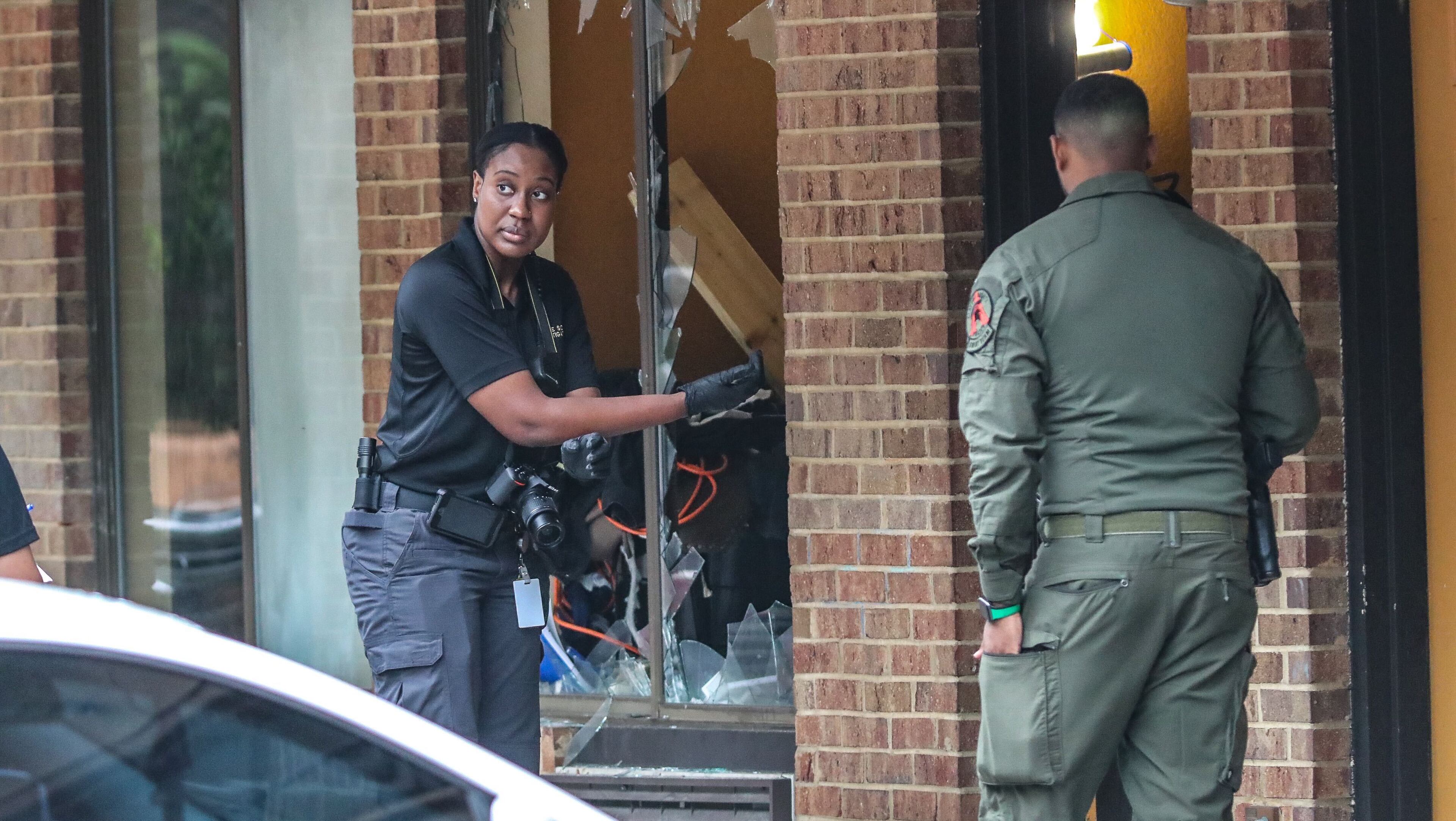 Clayton County police officers responded to gunfire at the American Inn & Suites on Old Dixie Highway on Thursday morning, leading to an hour-and-a-half-long SWAT standoff when the suspect barricaded himself inside his hotel room. He was taken into custody after the standoff ended and no one was injured.