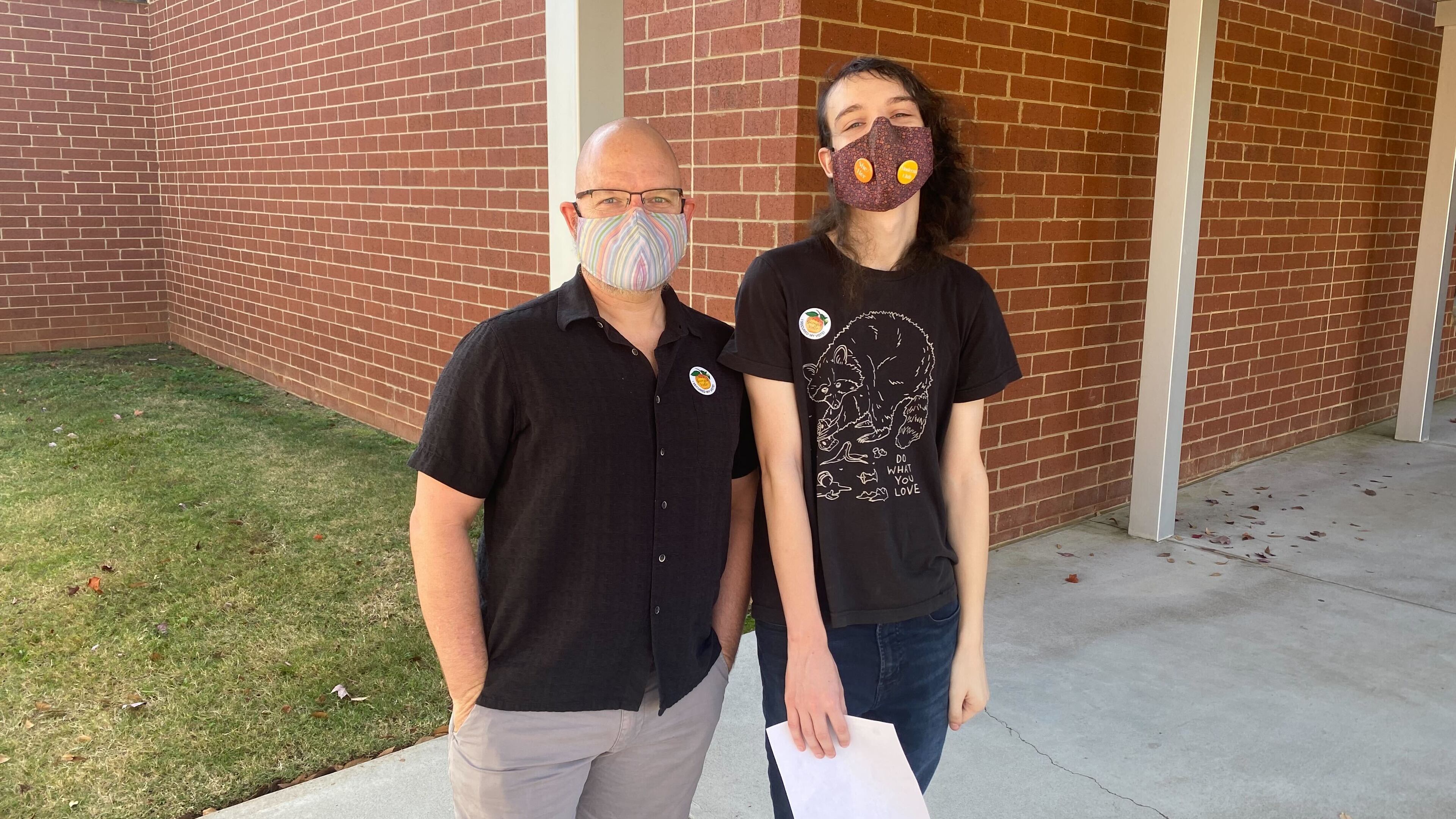 Father and son Steve and Kyra Joiner voted at Vickery Mill Elementary School in Roswell.