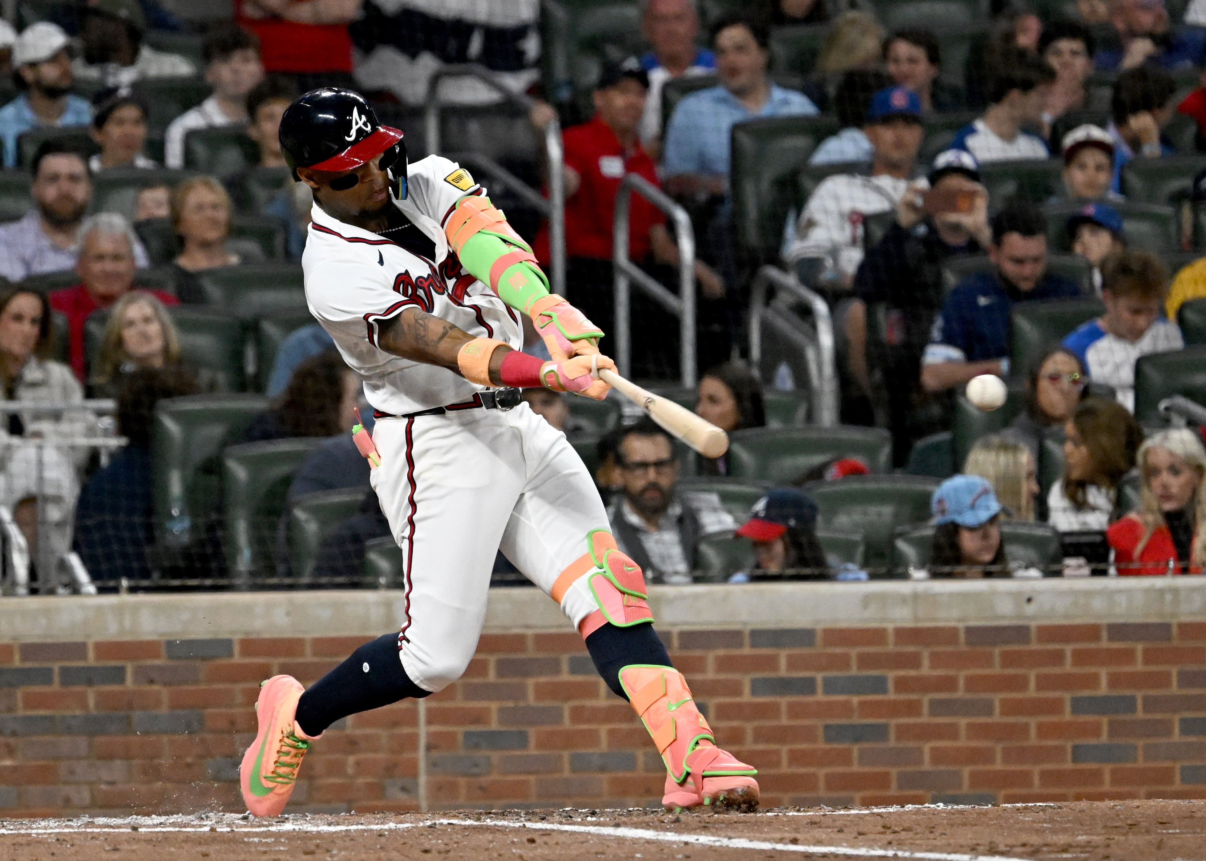 Atlanta Braves right fielder Ronald Acuña Jr. (13) hits a single during the fourth inning of a baseball game at Truist Park, Saturday, March 28, 2026, in Atlanta. Atlanta Braves Dominic Smith hit a grand slam during the 9th inning to win 6-2 over Kansas City Royals. (Hyosub Shin/AJC)