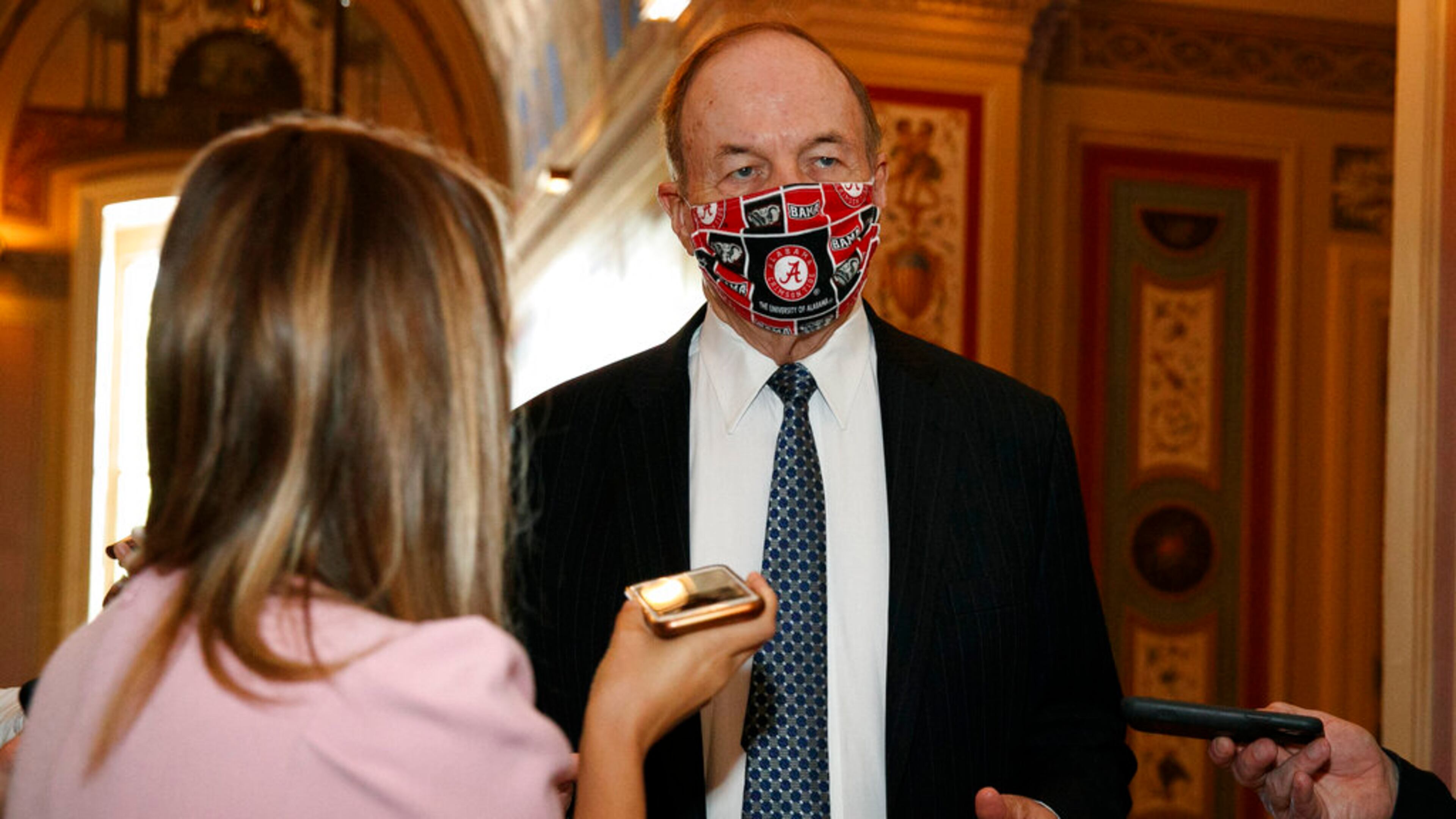 Sen. Richard Shelby, R-Ala., speaks to reporters outside a meeting with Treasury Secretary Steven Mnuchin and White House Chief of Staff Mark Meadows, Tuesday, July 21, 2020, on Capitol Hill in Washington. (AP Photo/Jacquelyn Martin)