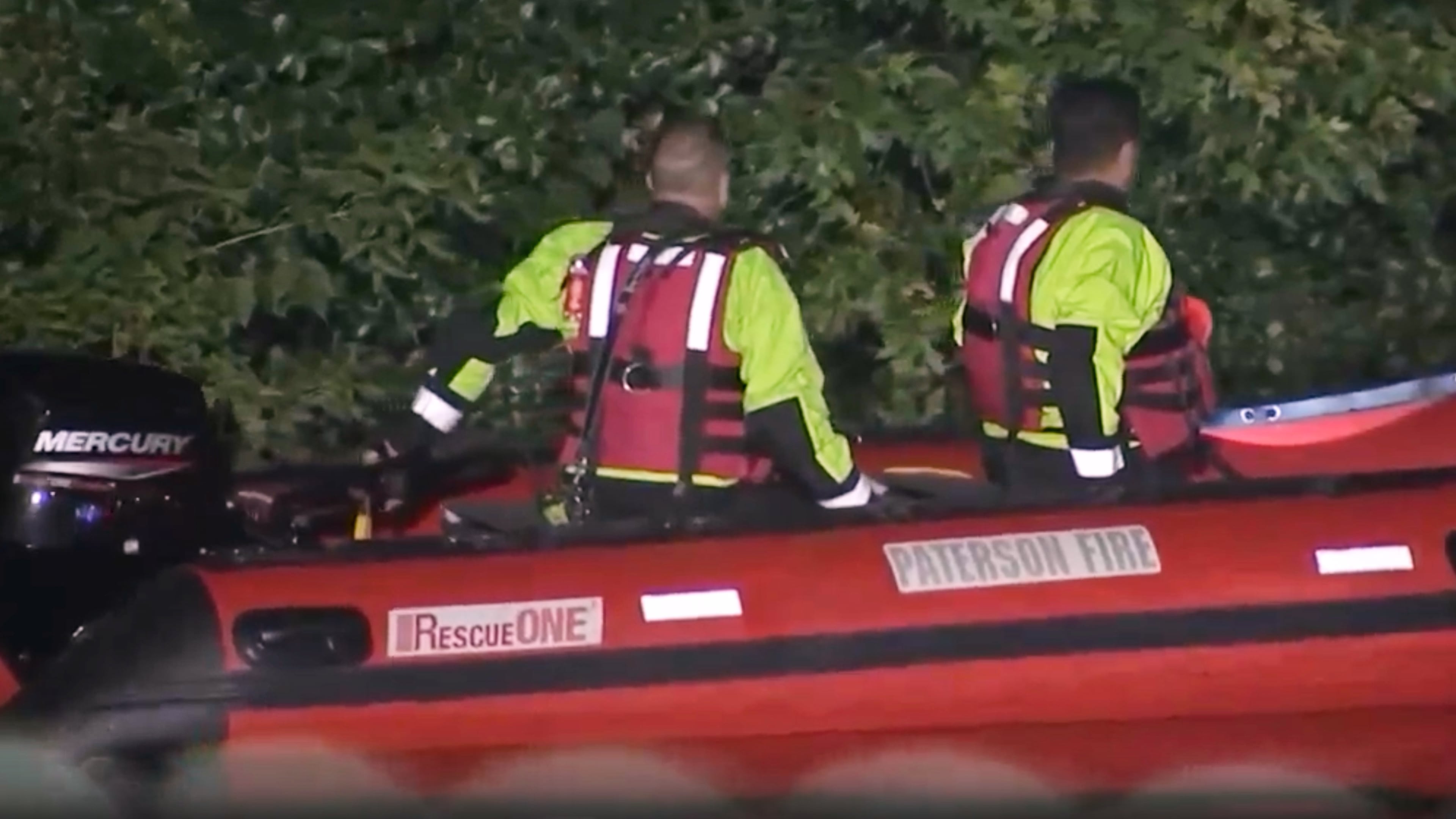 In this image taken from WABC-TV video, first responders search for missing children in the Passaic River, Wednesday, July 29, 2026, near Passaic, N.J. (WABC-TV via AP)