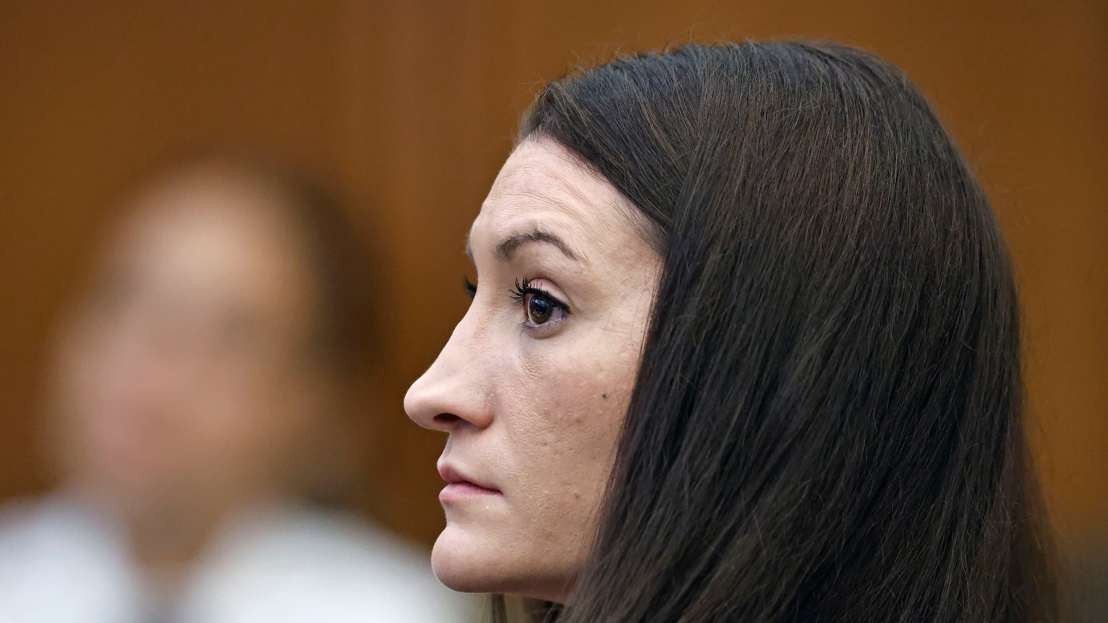 Lindsay Clancy listens to a witness on video during her murder trial at Plymouth Superior Court, Monday, Aug. 24, 2026 in Plymouth, Mass. (Greg Derr/The Patriot Ledger via AP, Pool)