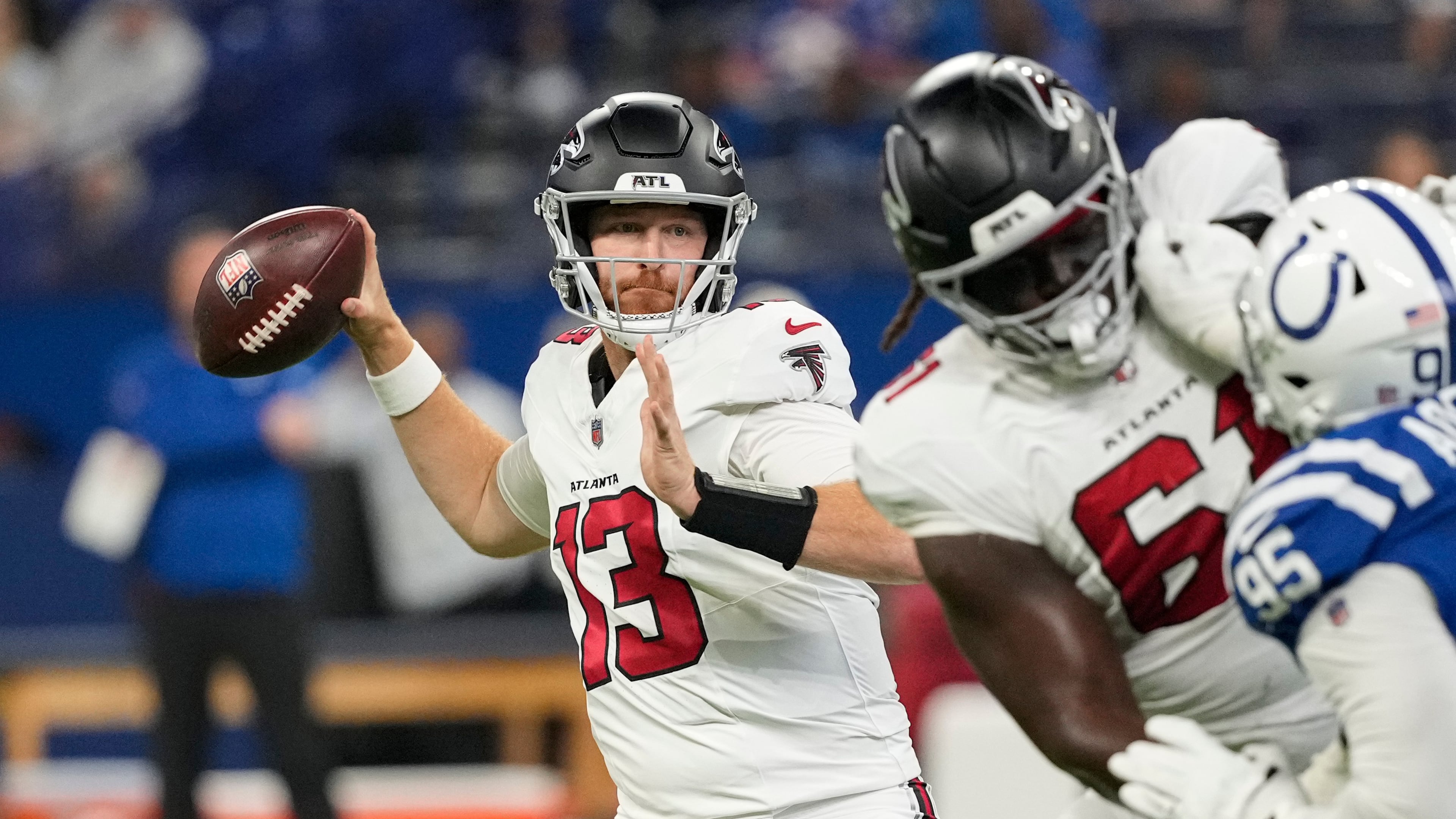 Atlanta Falcons quarterback Cooper Rush (13) throws against the Indianapolis Colts during the first half of an NFL football game in Indianapolis, Saturday, Aug. 22, 2026. (AP Photo/Nam Y. Huh)