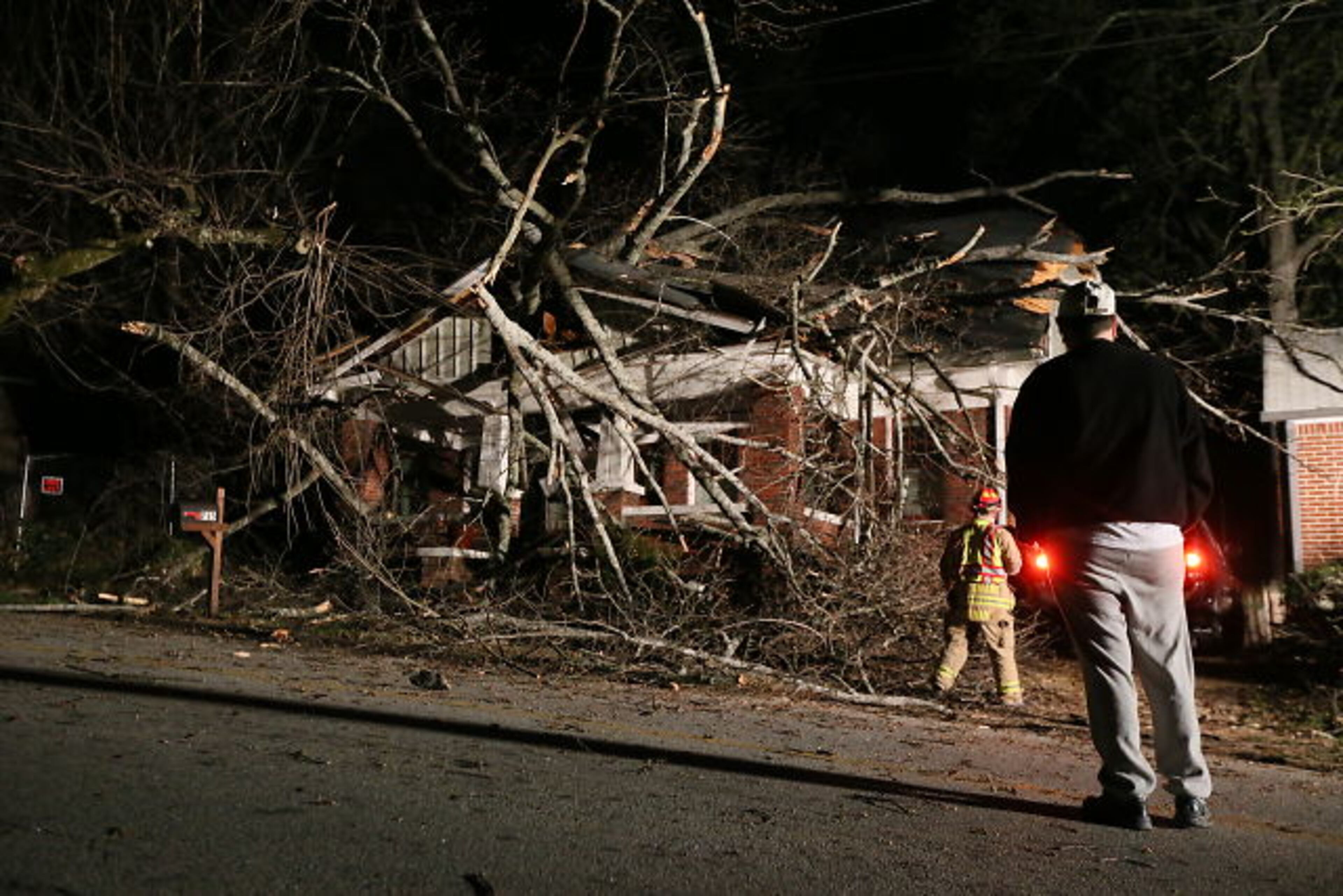 Some Decatur residents were also without power Wednesday after a large oak tree came crashing down onto a house.