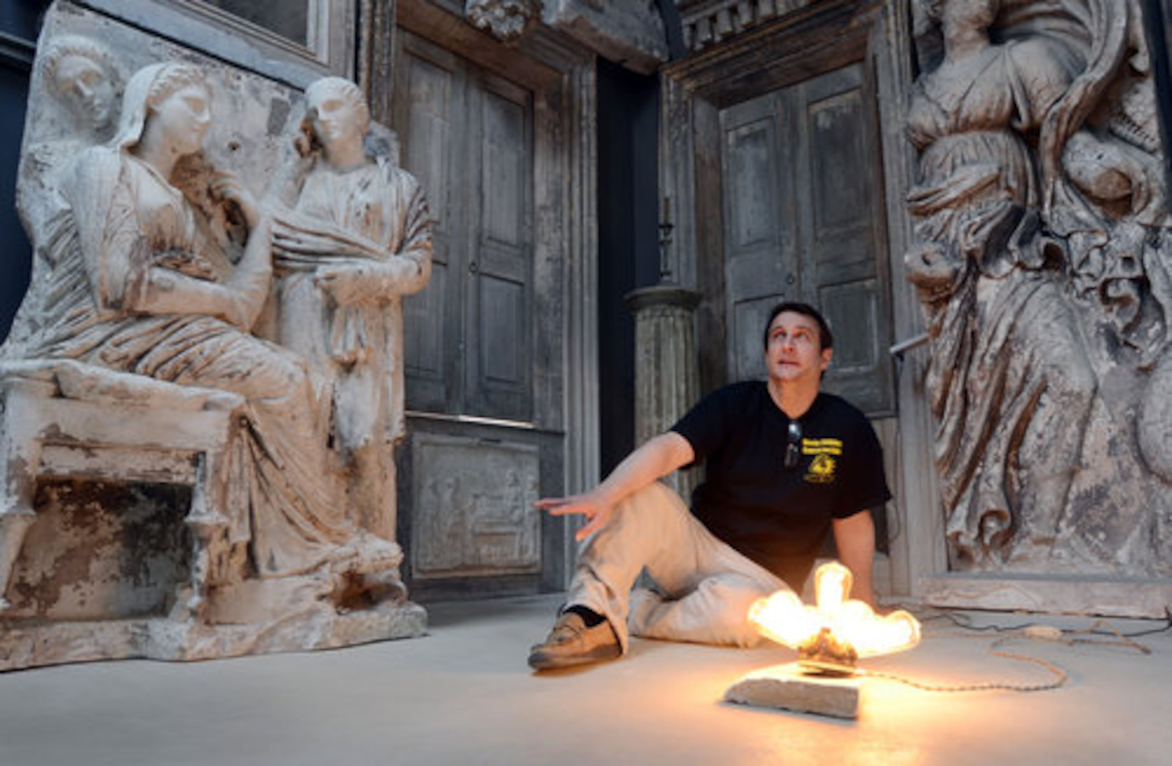 Bronson Pinchot discusses the Greek Architecture plaster casts that adorn his living room at his home in Harford, Pa.