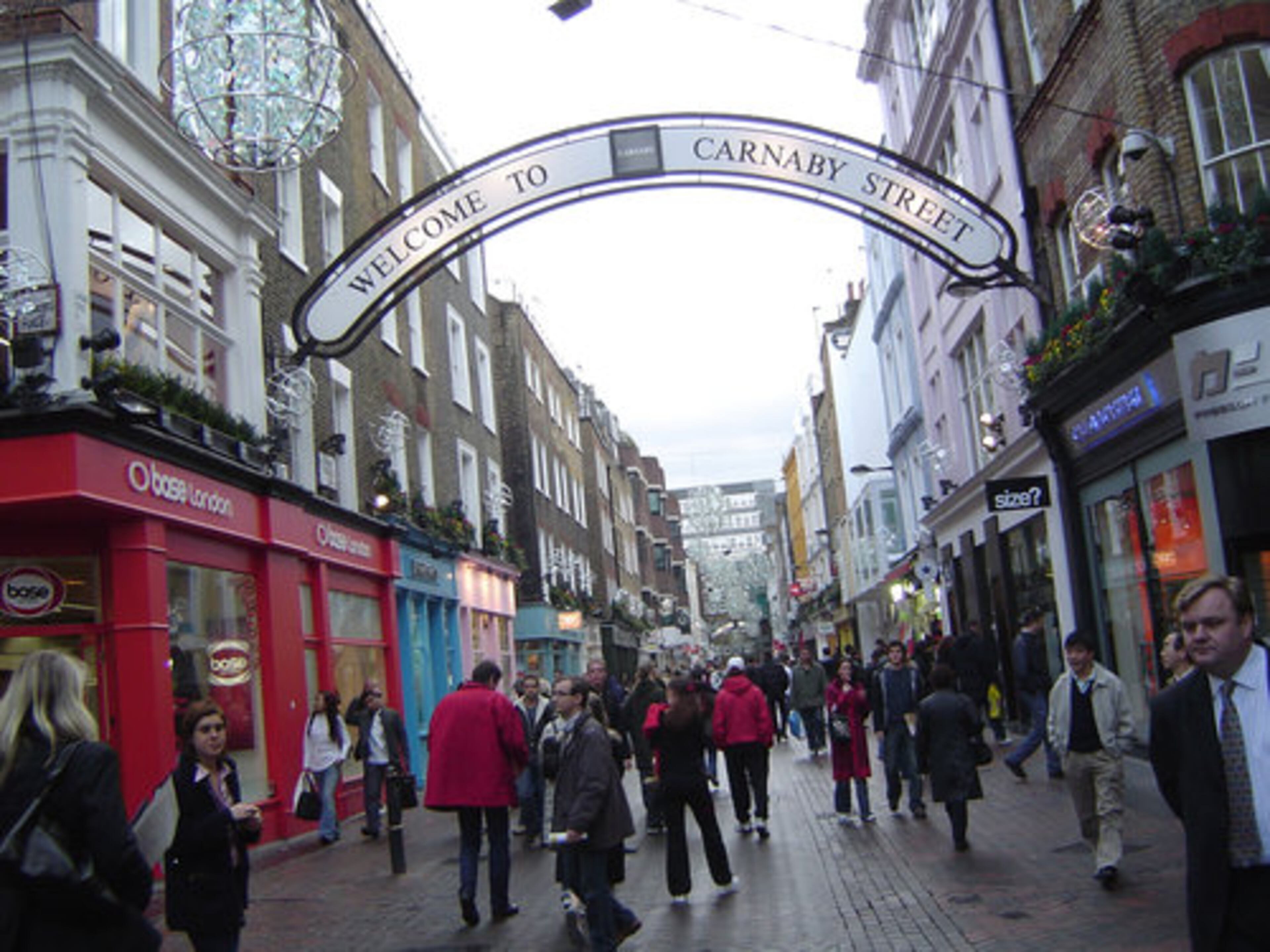 The holiday season brings out shoppers - even the tourists - of all tastes in styles to Carnaby Street in London, where about 170 shops and restaurants line a pedestrian-friendly area that began to reinvent itself around 1997. "I think it's been regenerated," said one shopper on a recent stroll.