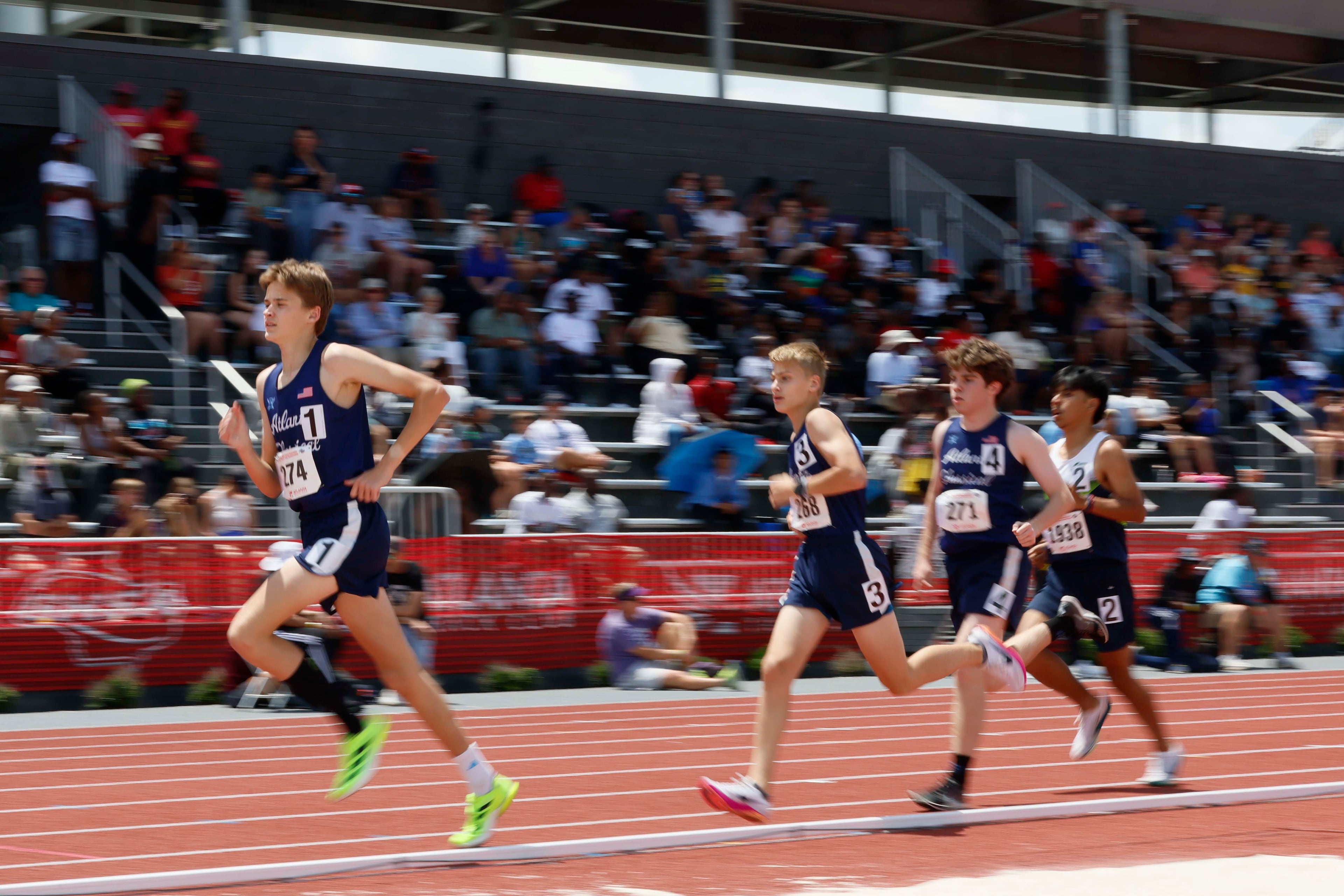 Sanders Hearne from Atlanta Classical Academy takes the lead during the Boys 1600-meter Run 1A Division 2 at the GHSA track and field state championships at UGA Spec Towns Track on Monday, May 11, 2026, in Athens.
(Miguel Martinez/AJC)