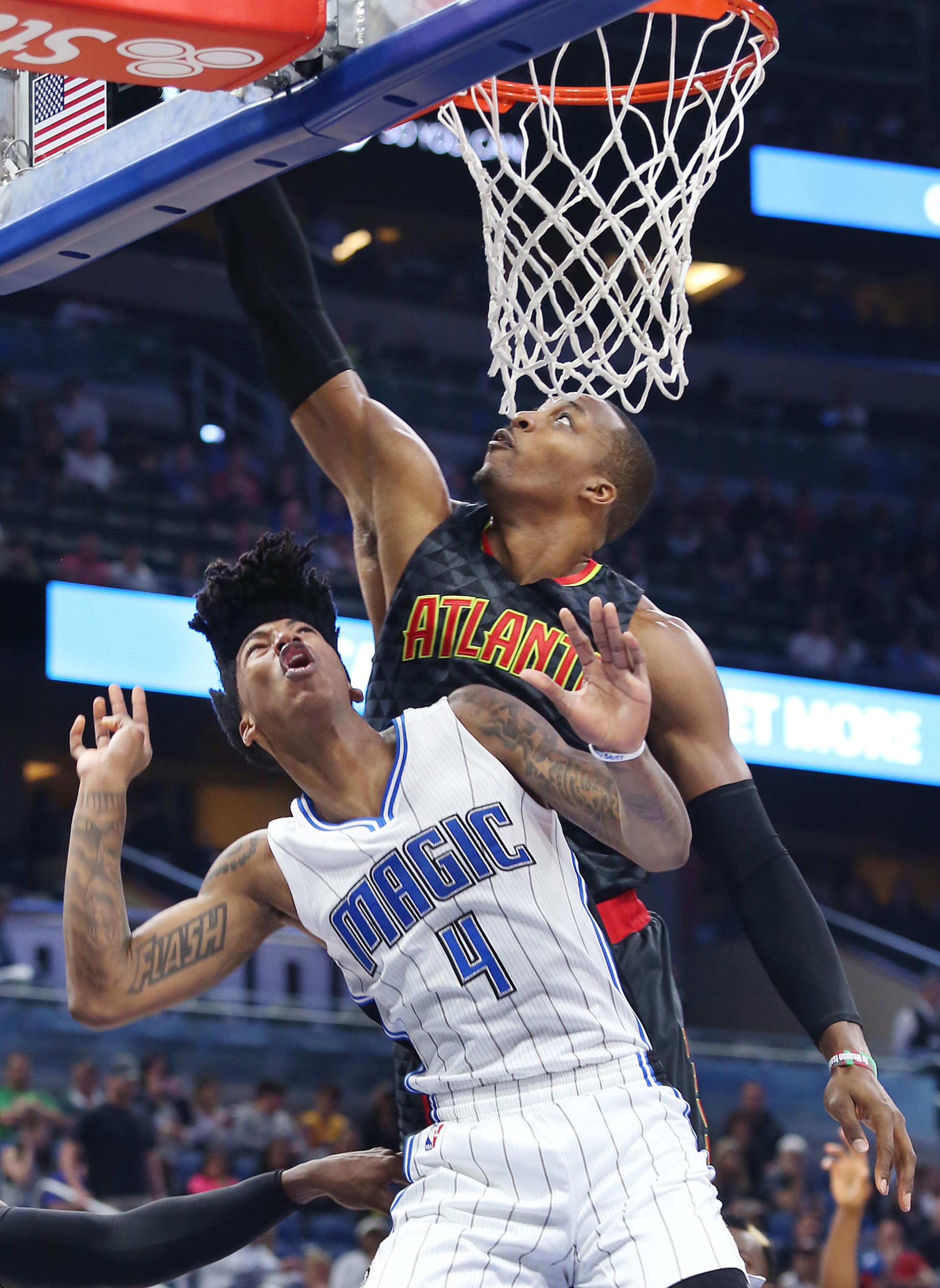 The Atlanta Hawks' Dwight Howard towers over the Orlando Magic's Elfrid Payton (4) during the first half at the Amway Center in Orlando, Fla., on Wednesday, Jan. 4, 2017. (Stephen M. Dowell/Orlando Sentinel/TNS)