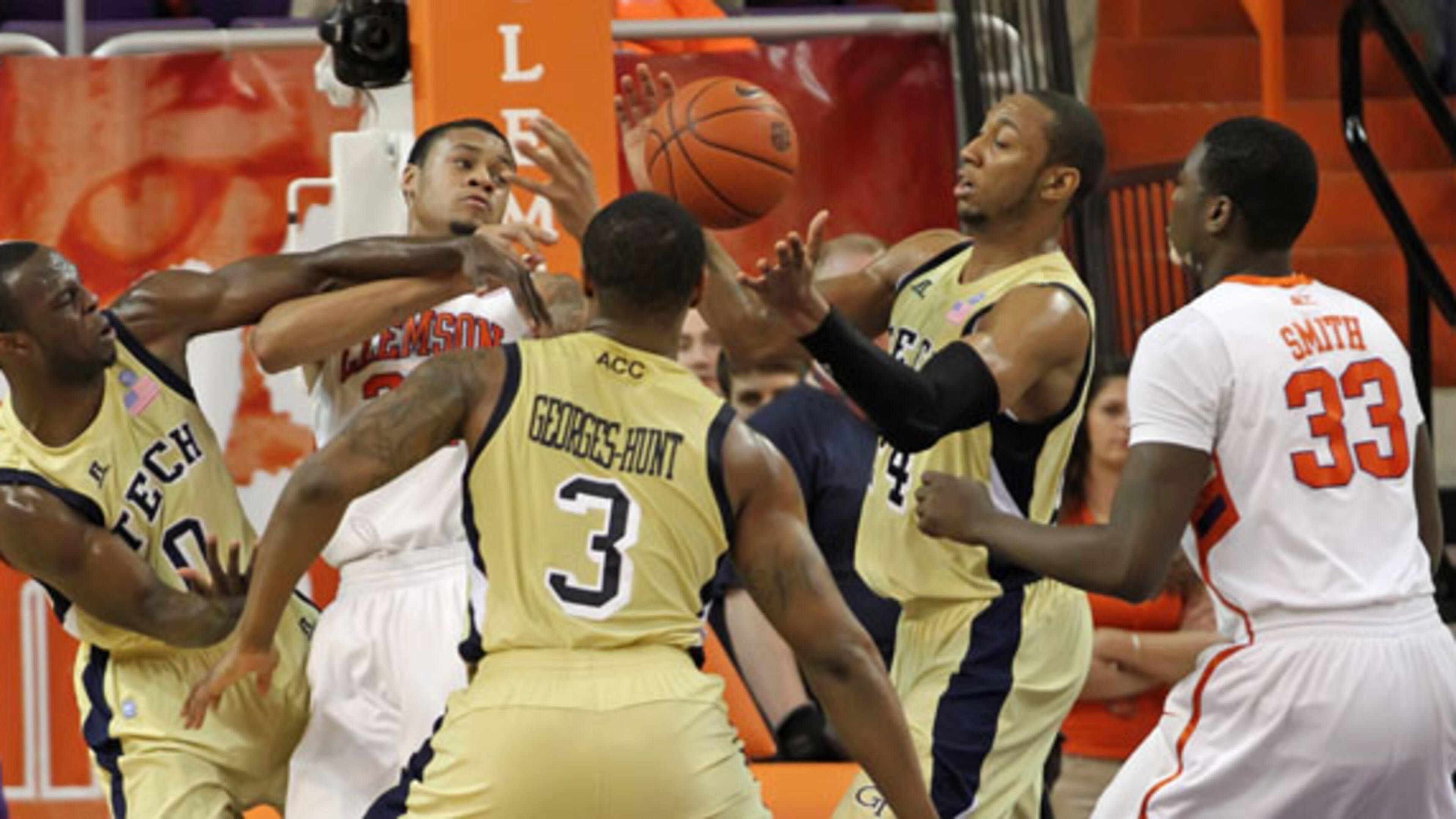 Georgia Tech and Clemson players try to come down with a rebound. The Jackets suffered their sixth consecutive loss to the Tigers.