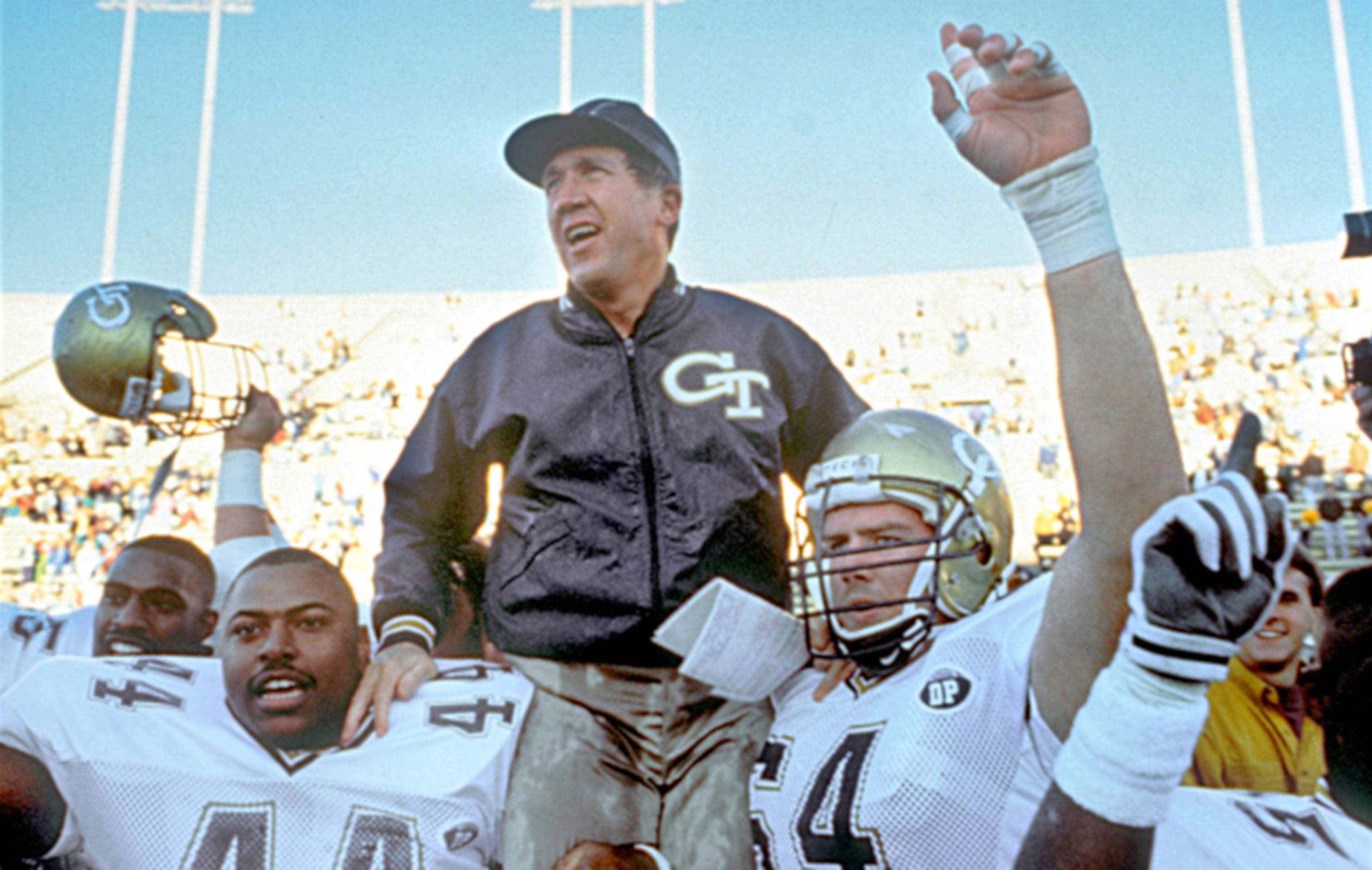Tech coach Bobby Ross gets a ride after his team beat Wake Forest to clinch the 1990 ACC title. It was the Jackets' first ACC title.
