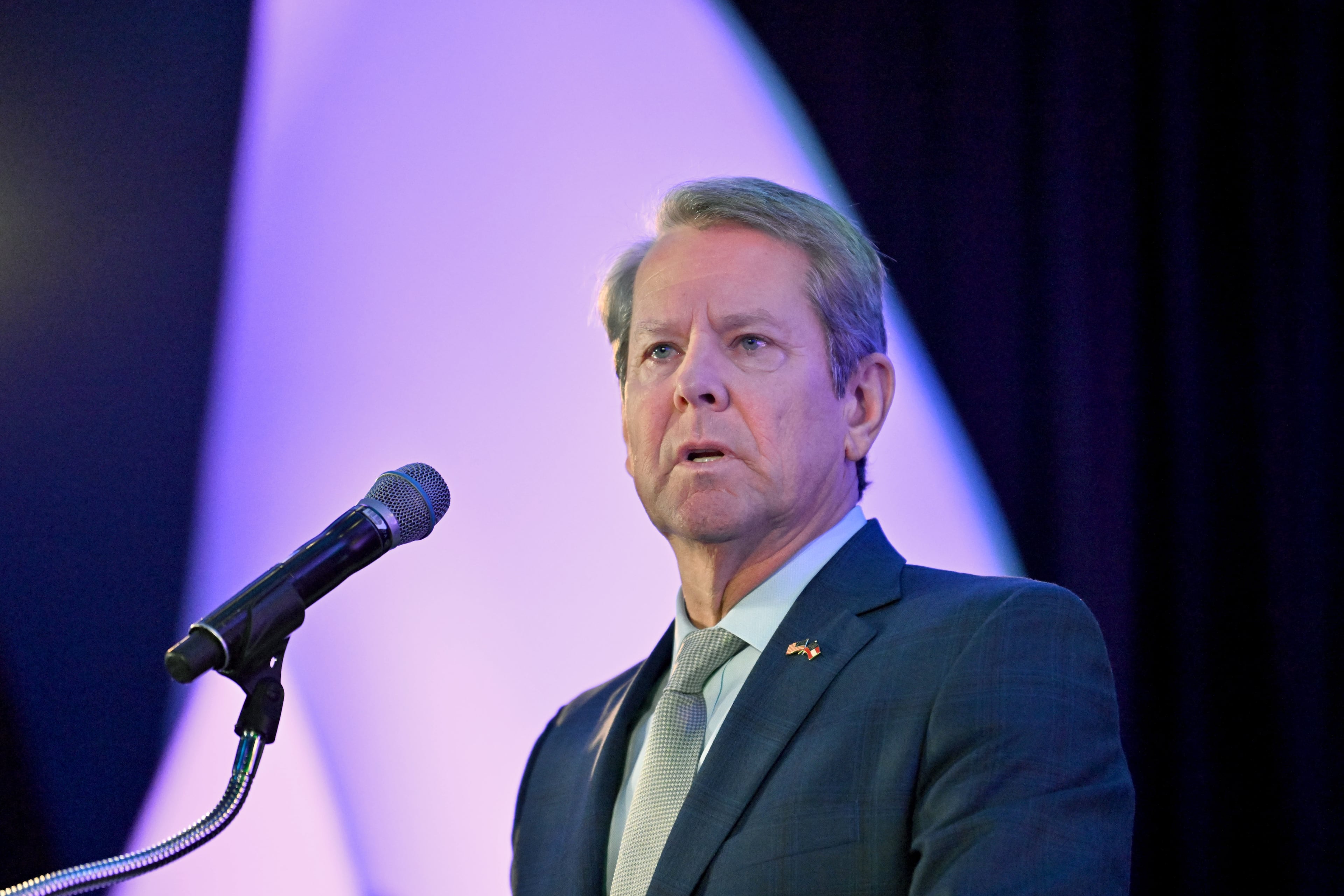 Gov. Brian Kemp speaks during an event at the Georgia Aquarium last month. (Hyosub Shin/AJC)