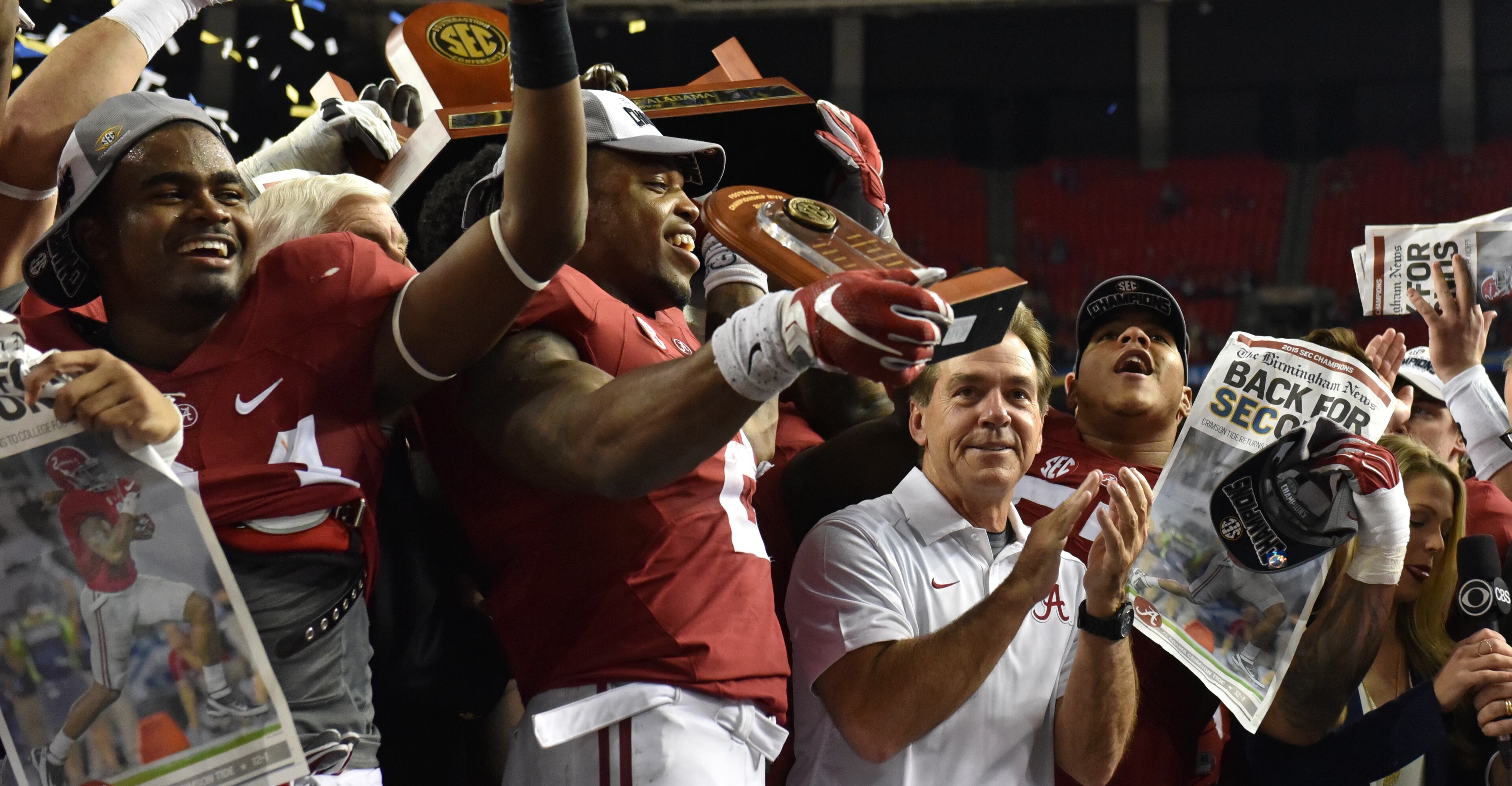 December 5, 2015 Atlanta: Nick Saban and his players celebrate their SEC Championship win over Florida at the Georgia Dome Saturday December 5, 2015. BRANT SANDERLIN/BSANDERLIN@AJC.COM