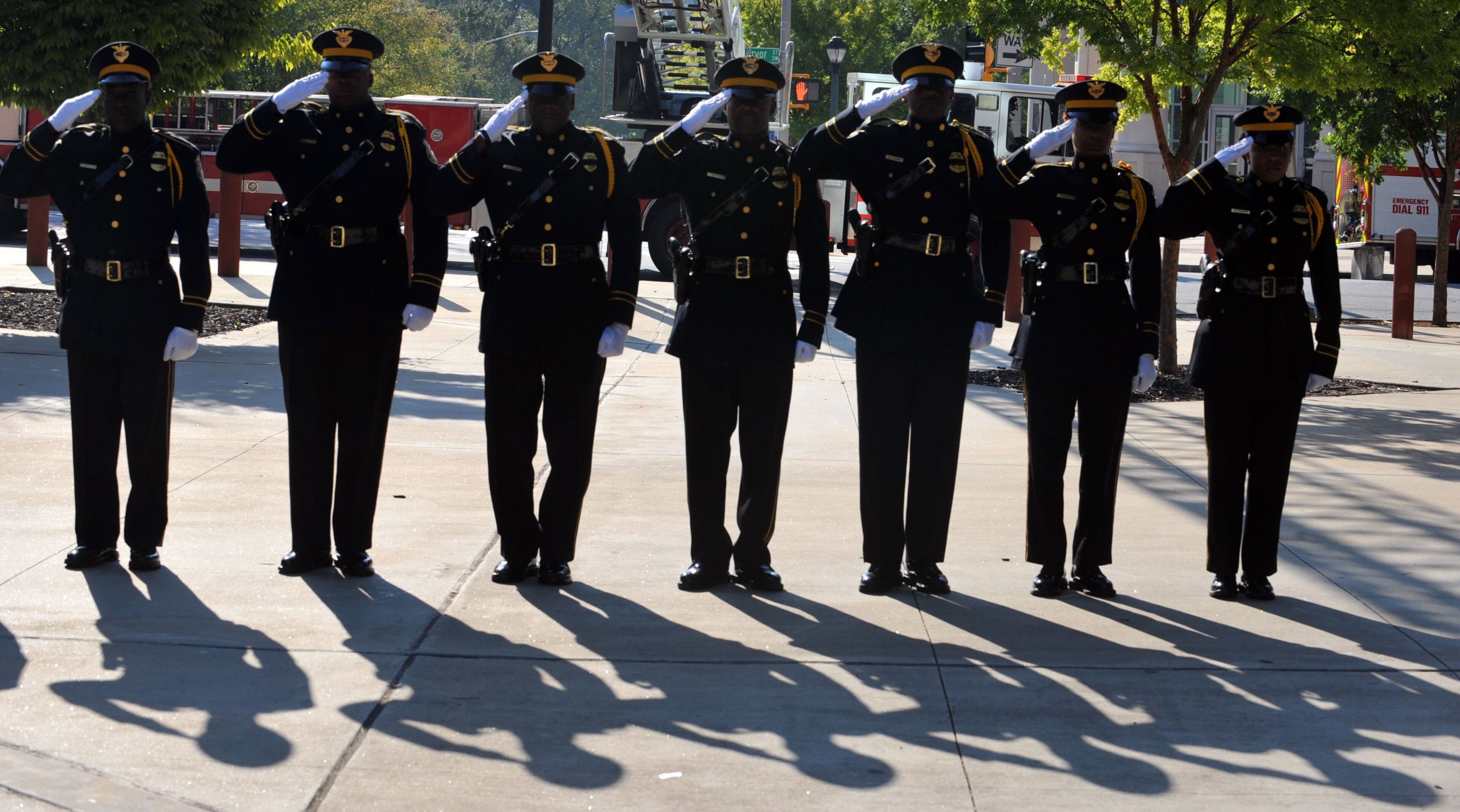The APD Honor Guard stands at attention during the National Anthem. Officials with the Atlanta Police Department and Atlanta Fire Rescue Department honored the 12th anniversary of the Sept. 11, 2001, tragedy during a ceremony at Public Safety Headquarters on Sept. 11, 2013.