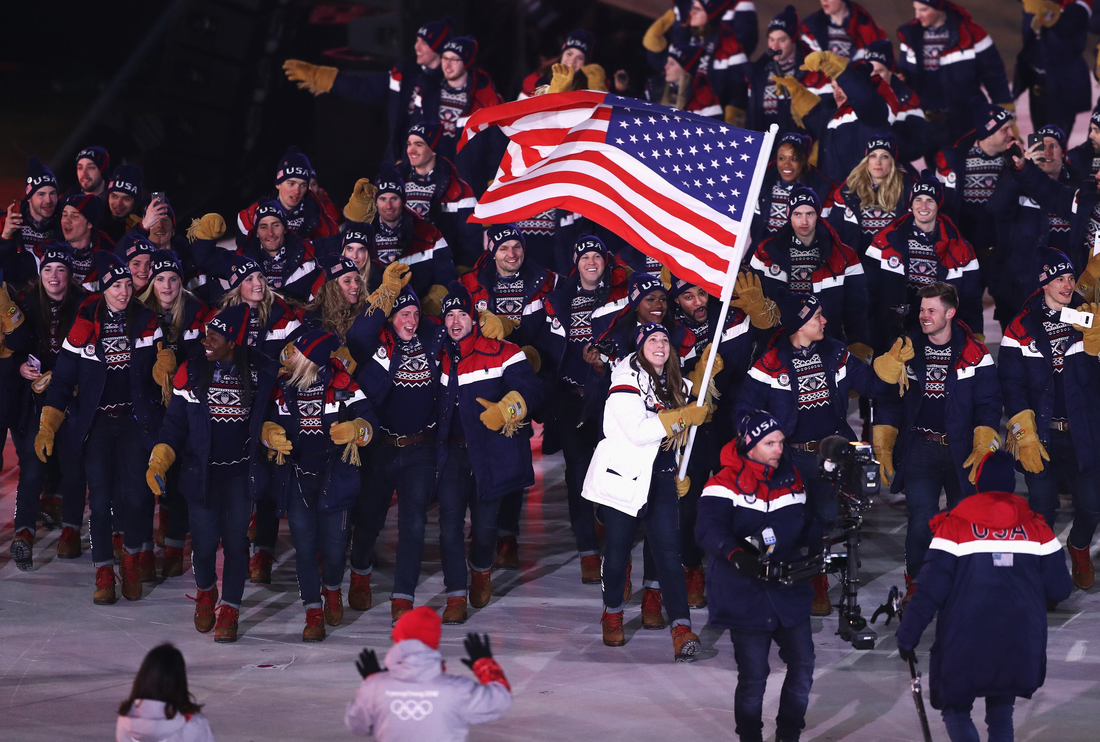 PYEONGCHANG-GUN, SOUTH KOREA - FEBRUARY 09: Flag bearer Erin Hamlin of the United States leads the team during the Opening Ceremony of the PyeongChang 2018 Winter Olympic Games at PyeongChang Olympic Stadium on February 9, 2018 in Pyeongchang-gun, South Korea. (Photo by Ryan Pierse/Getty Images)