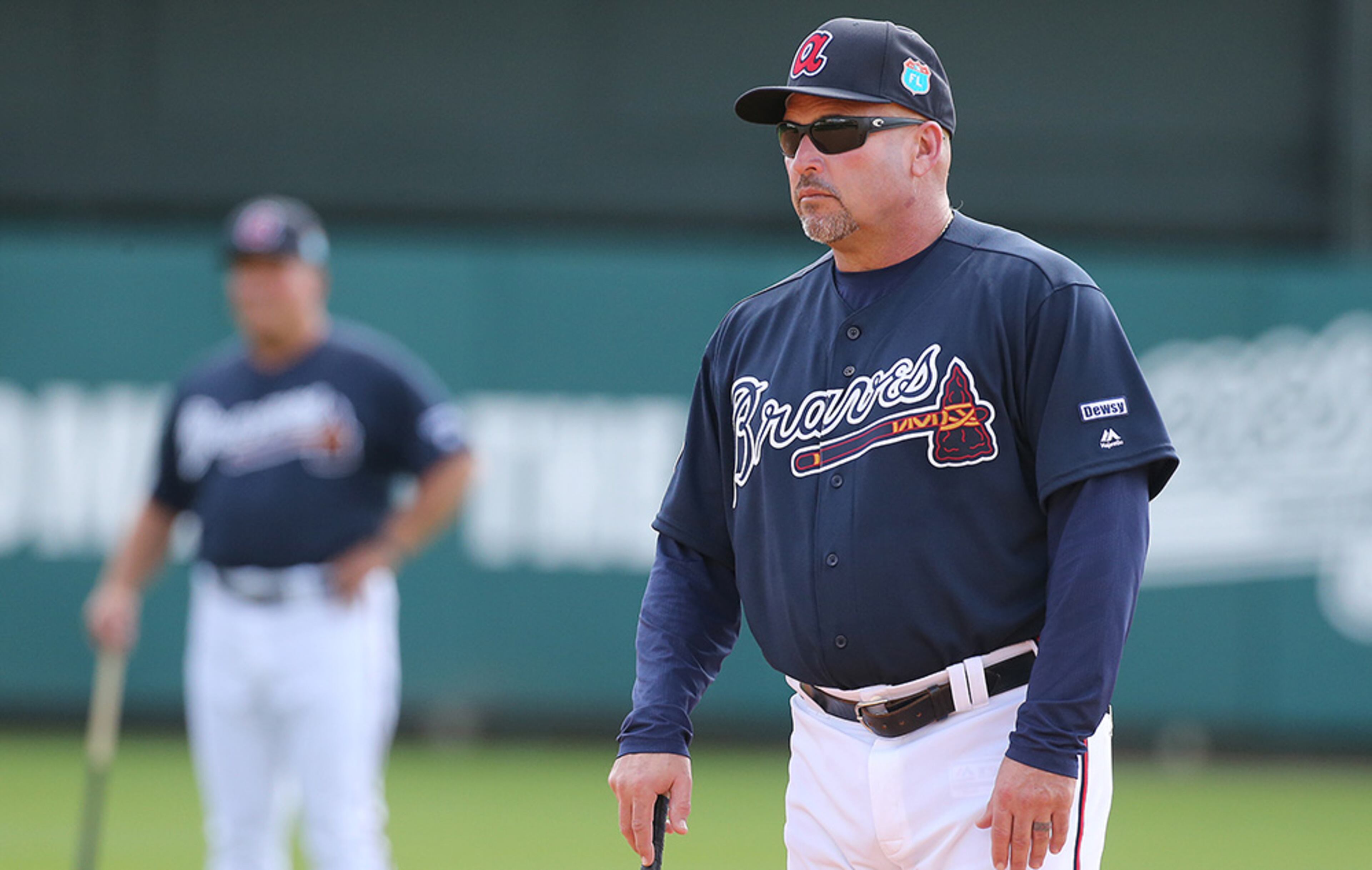 Braves manager Fredi Gonzalez watches over practice during spring training workouts Monday, Feb. 22, 2016, at Champion Stadium in the ESPN Wide World of Sports in Lake Buena Vista, Fla.