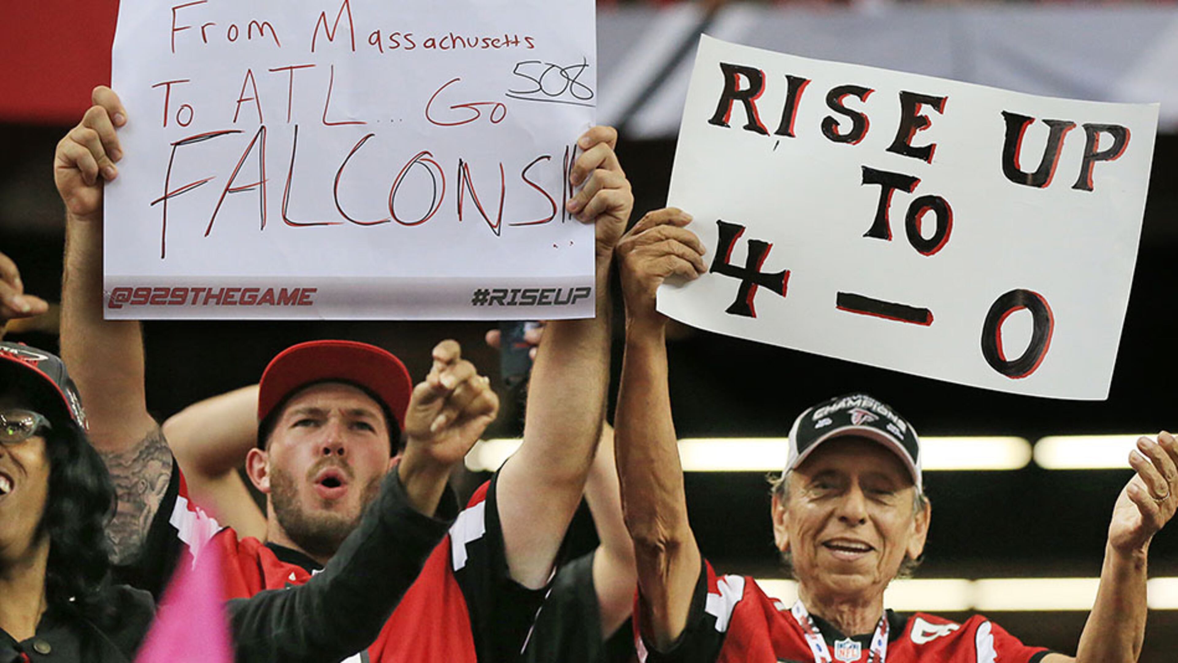 100415 ATLANTA: Falcons fans cheer as the team improves to 4-0 with a 48-21 victory over the Texans in a football game on Sunday, Oct. 4, 2015, in Atlanta. Curtis Compton / ccompton@ajc.com
