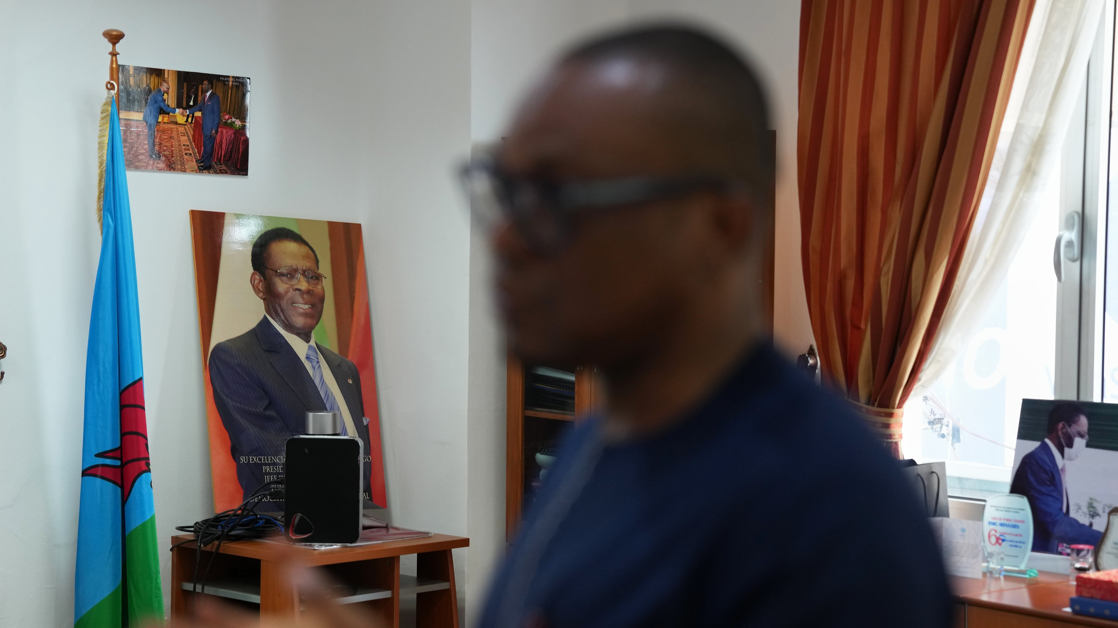 Framed portraits of Equatorial Guinea President, Teodoro Obiang Nguema Mbasogo, displayed in an office setting in Malabo, Equatorial Guinea, Friday, April 24, 2026. (AP Photo/Misper Apawu)