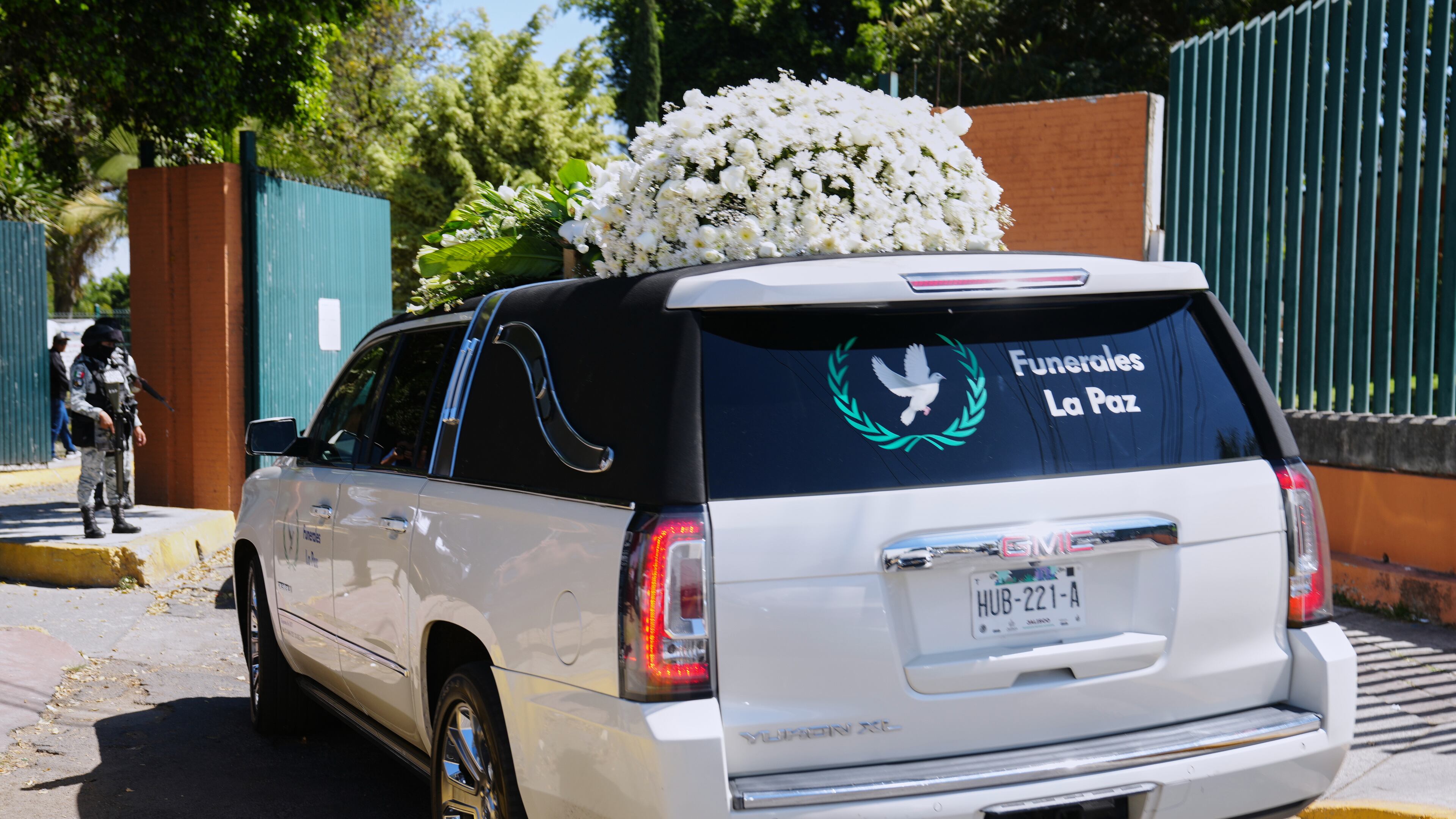 A car carrying the remains of who authorities identified as the late Jalisco New Generation Cartel leader Nemesio Oseguera, alias "El Mencho," arrives at Recinto de Paz cemetery in Guadalajara, Mexico, Monday, March 2, 2026. (AP Photo/Refugio Ruiz)