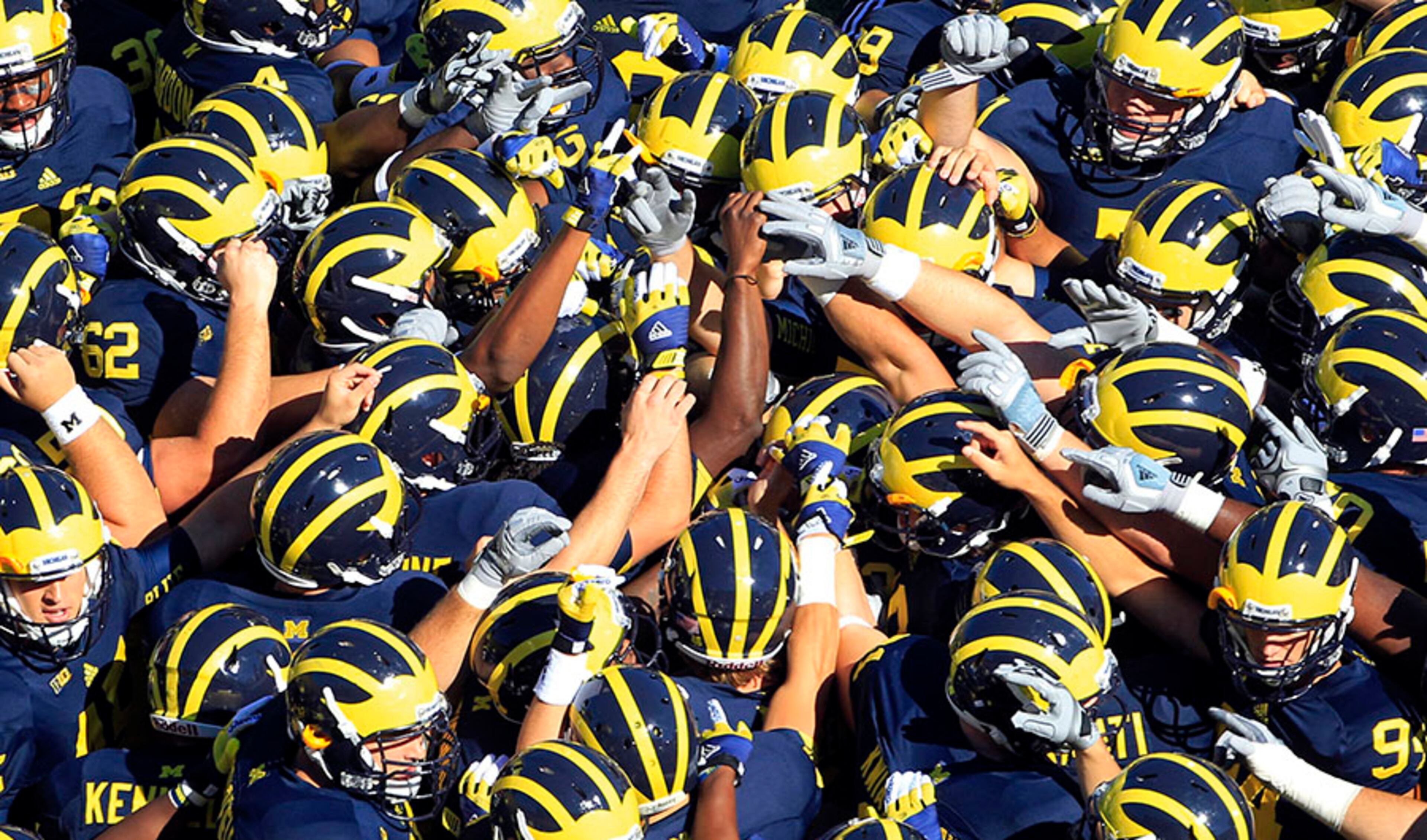 Michigan began wearing a variation of the winged helmet since 1938 when it ditched it's solid black headgear. The maize and blue has seem some updates throughout the years, but that helmet has remained for more than 50 years.