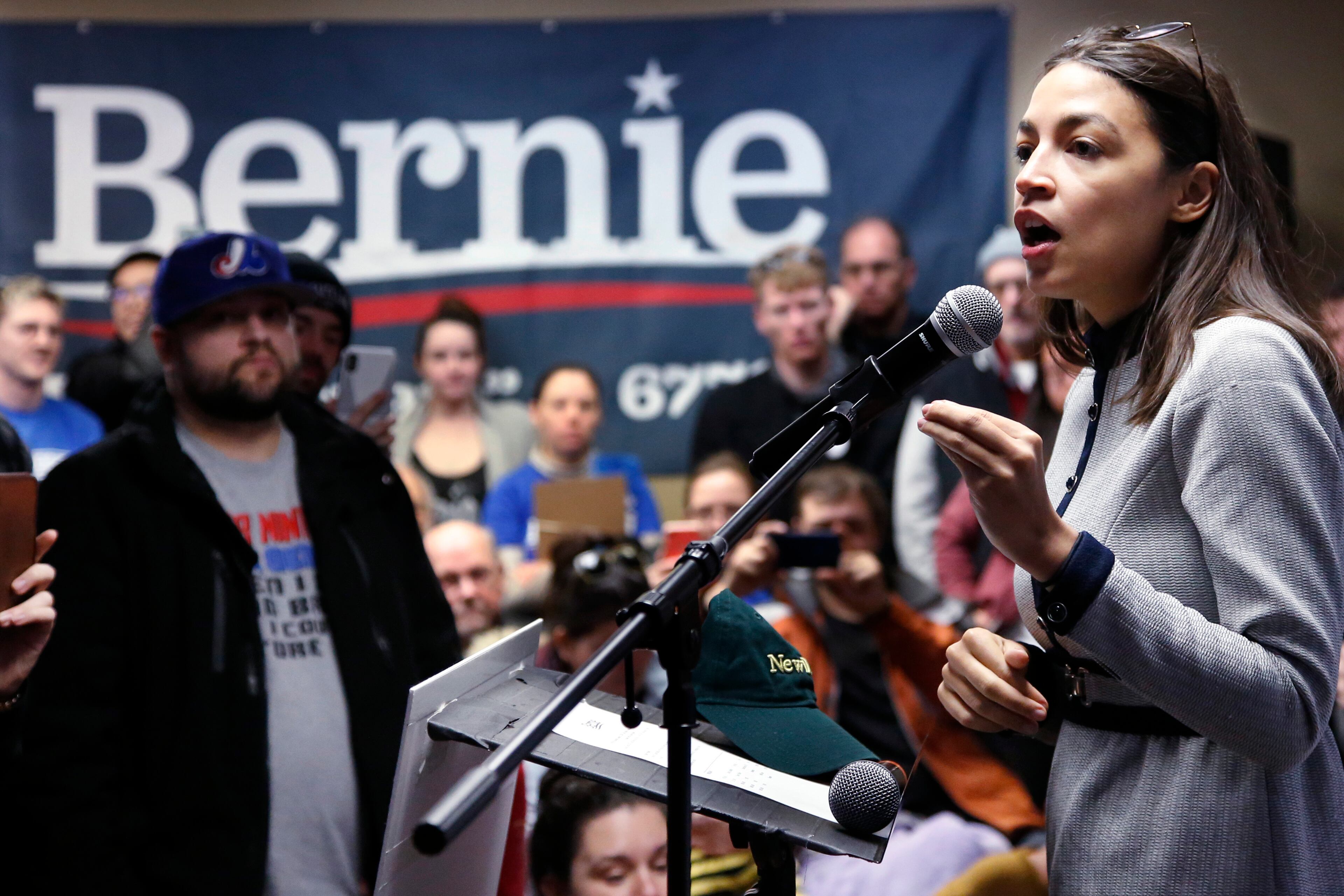 Rep. Alexandria Ocasio-Cortez speaks as a surrogate of Democratic presidential candidate Bernie Sanders on Saturday in Iowa.