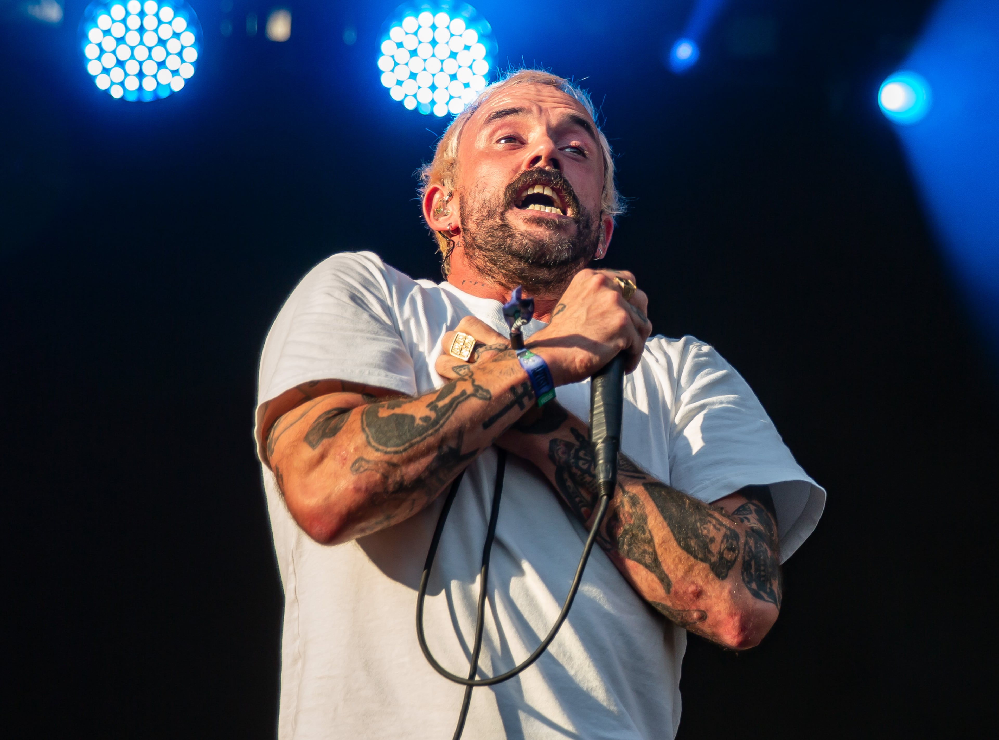 A few songs deep, Idles frontman Joe Talbot shared the origin of their song “Mother,” an ode to his own late mother, during Day 1 of Shaky Knees on Friday, Sept. 19, 2025, in Atlanta. (Ryan Fleisher for the AJC)