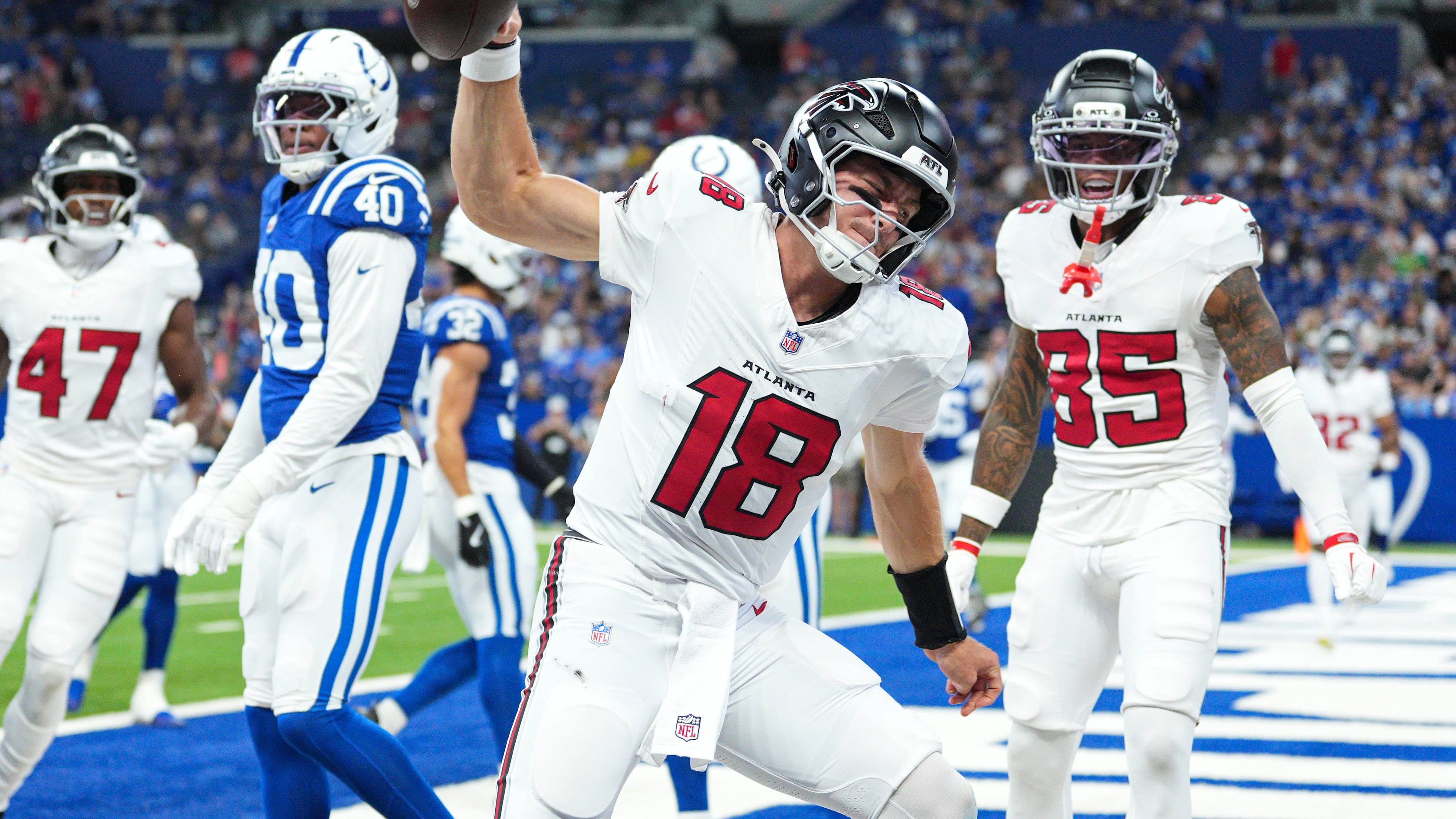 Atlanta Falcons quarterback Jack Strand (18) celebrates a touchdown against the Indianapolis Colts during the second half of an NFL football game in Indianapolis, Saturday, Aug. 22, 2026. (AP Photo/AJ Mast)
