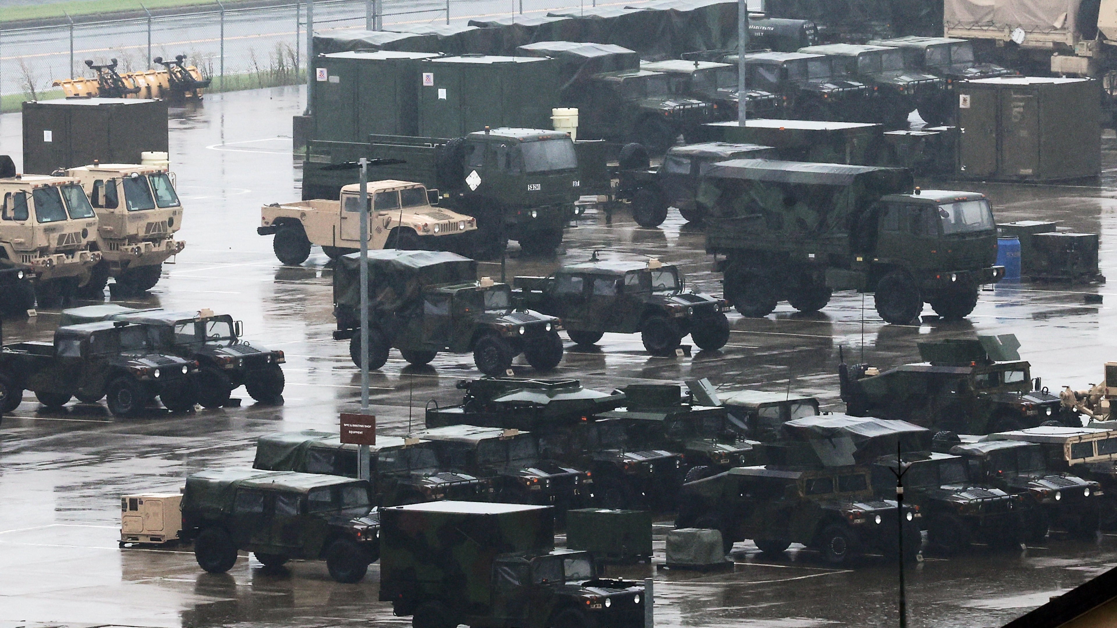 U.S. military vehicles are parked at Camp Humphreys in Pyeongtaek, South Korea, Friday, Aug. 21, 2026. (Hong Ki-won/Yonhap via AP)