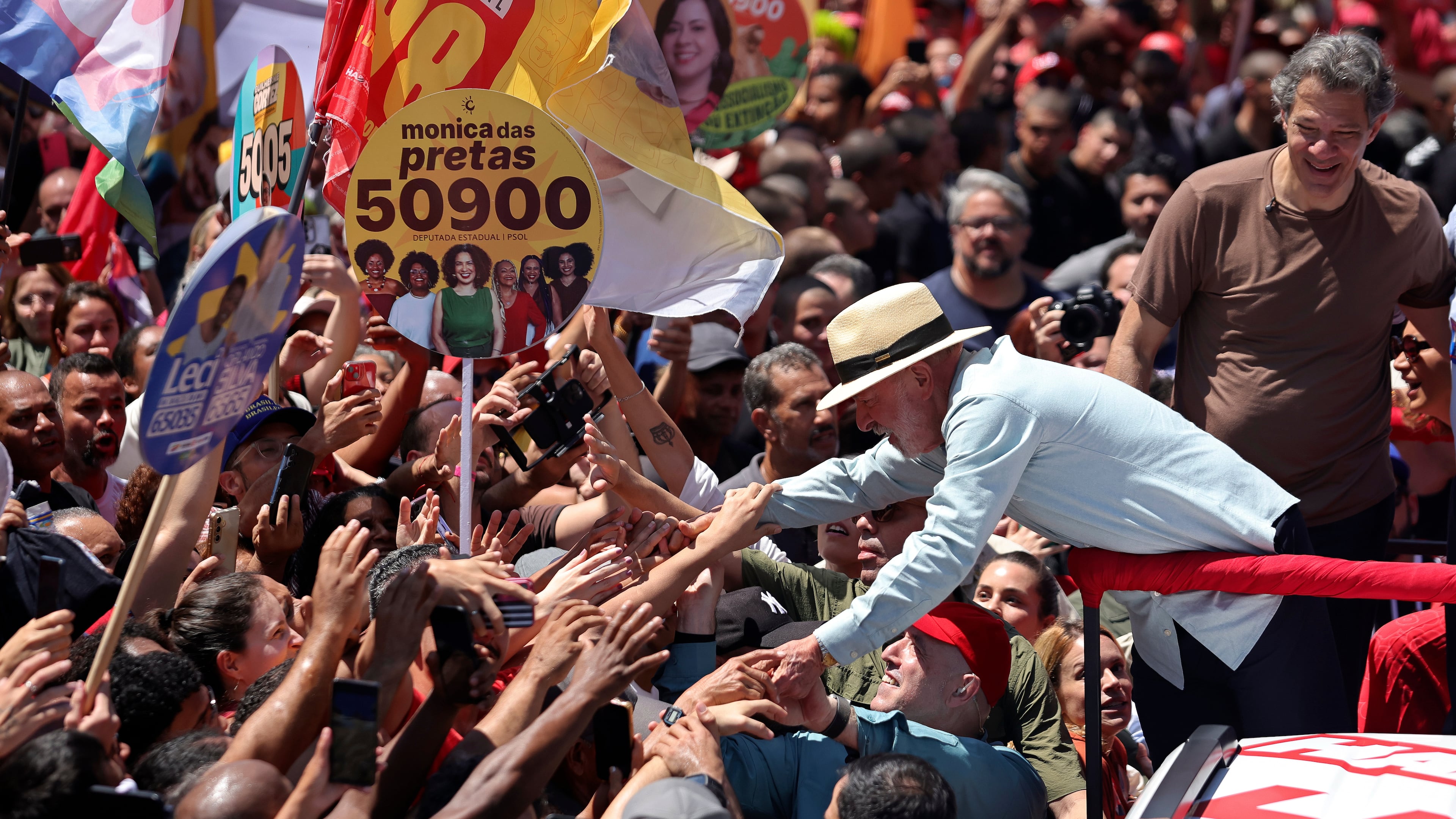 Brazilian President Luiz Inacio Lula da Silva, who is running for reelection, greets supporters during a campaign rally in Sao Paulo, Brazil, Saturday, Sept. 26, 2026. (AP Photo/Allison Sales)